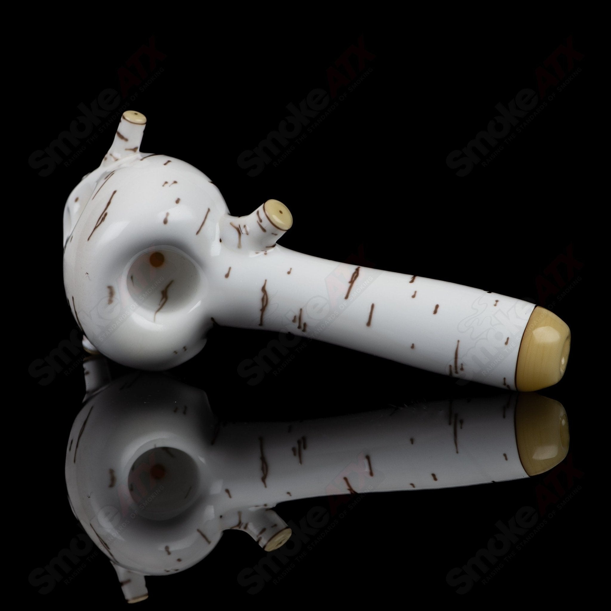 Foster Glass Heady Glass Birch Skull Spoon hand pipe with detailed birch wood design and skull motif for smoking.