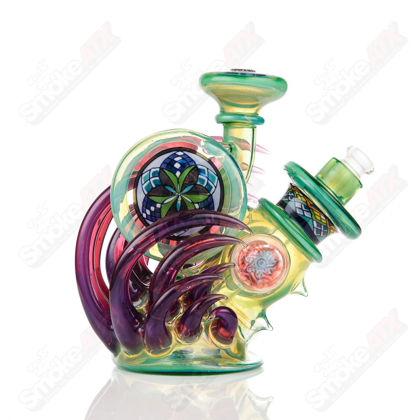 Freeek Glass Fillacello Squat Lock Rig, a colorful heady glass concentrate rig with intricate design and glass accents.