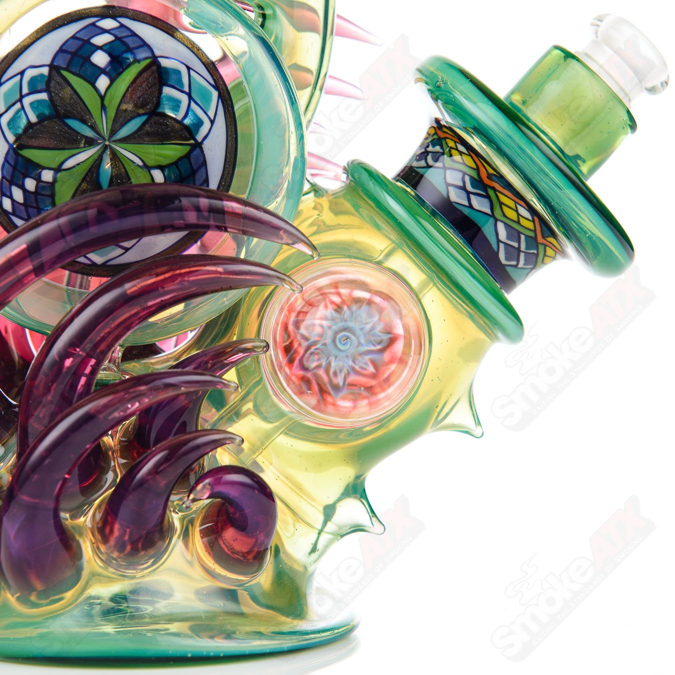 Freeek Glass Fillacello Squat Lock Rig, a colorful heady glass concentrate rig with intricate design details.