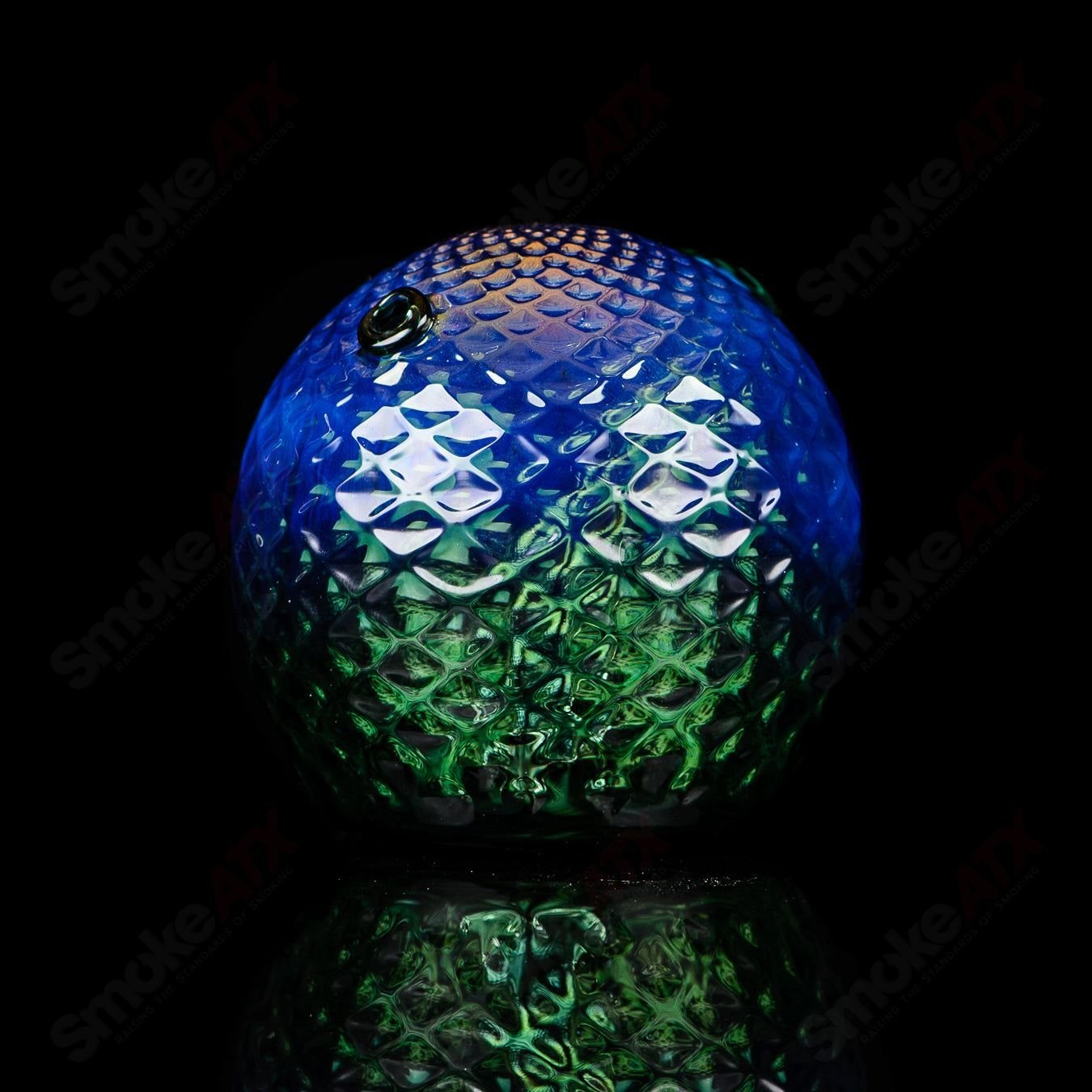 Fumed color sphere concentrate rig by James Lang, clear glass with colorful accents, designed for concentrate use.