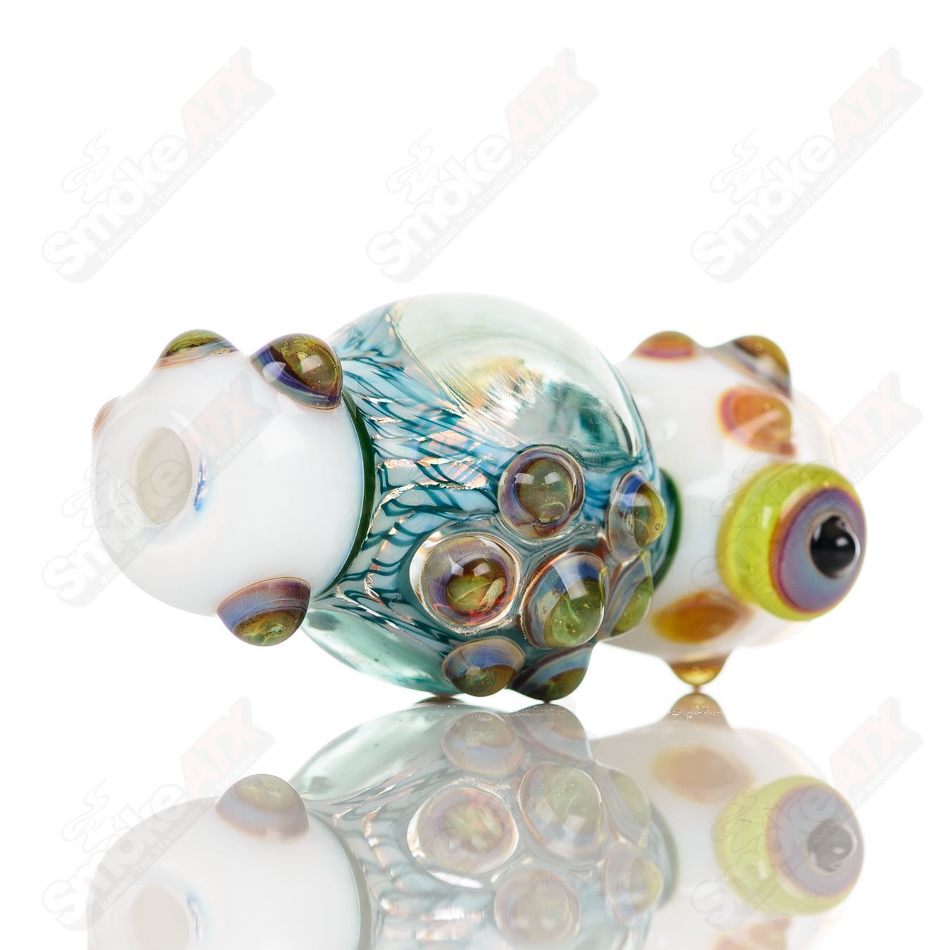 Small glass Chillum Baby Dabs dab pipe, compact and portable, designed for discreet use.