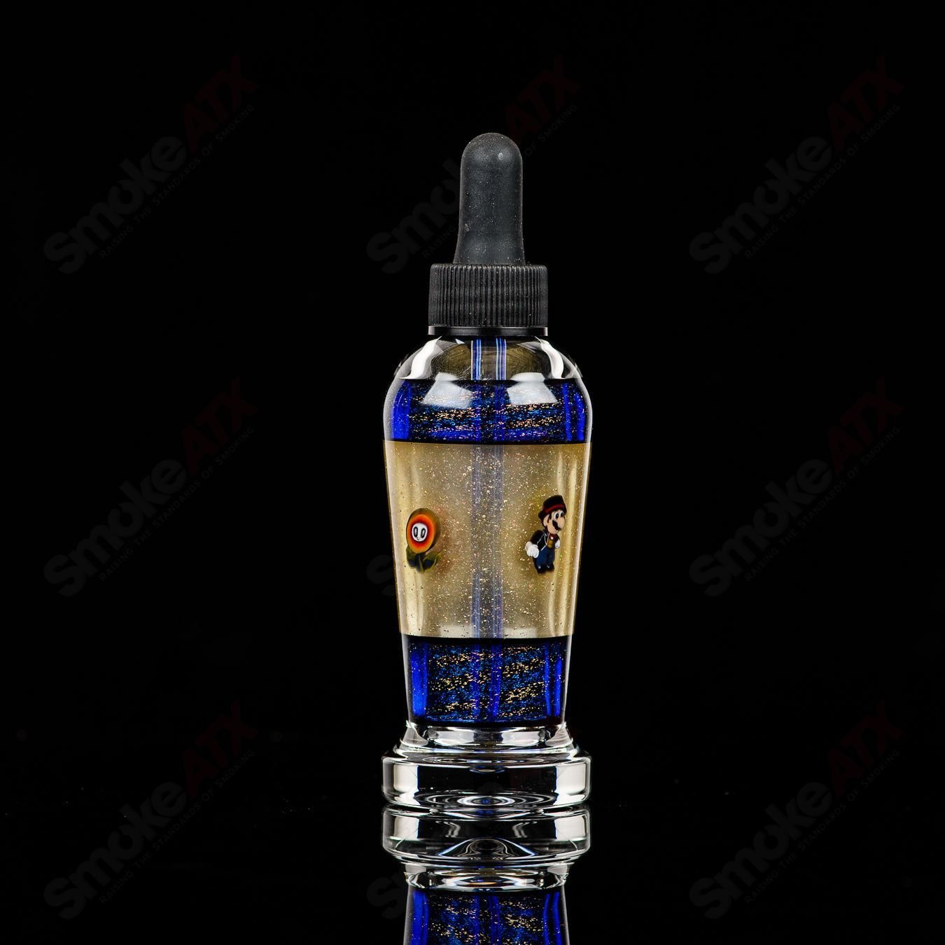 Micro Glass Heady Glass spray bottle with two spray nozzles, featuring a sleek, clear design for versatile use.