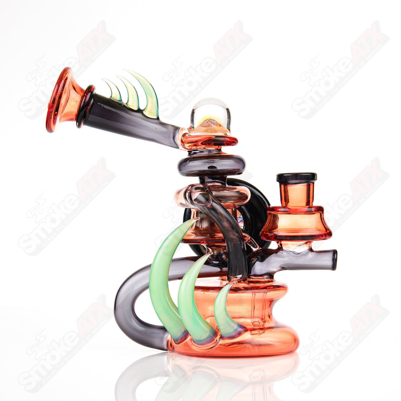 Freeek Glass Terpcycler Rig, a heady recycler glass piece with intricate design and clear glass construction for dabbing.