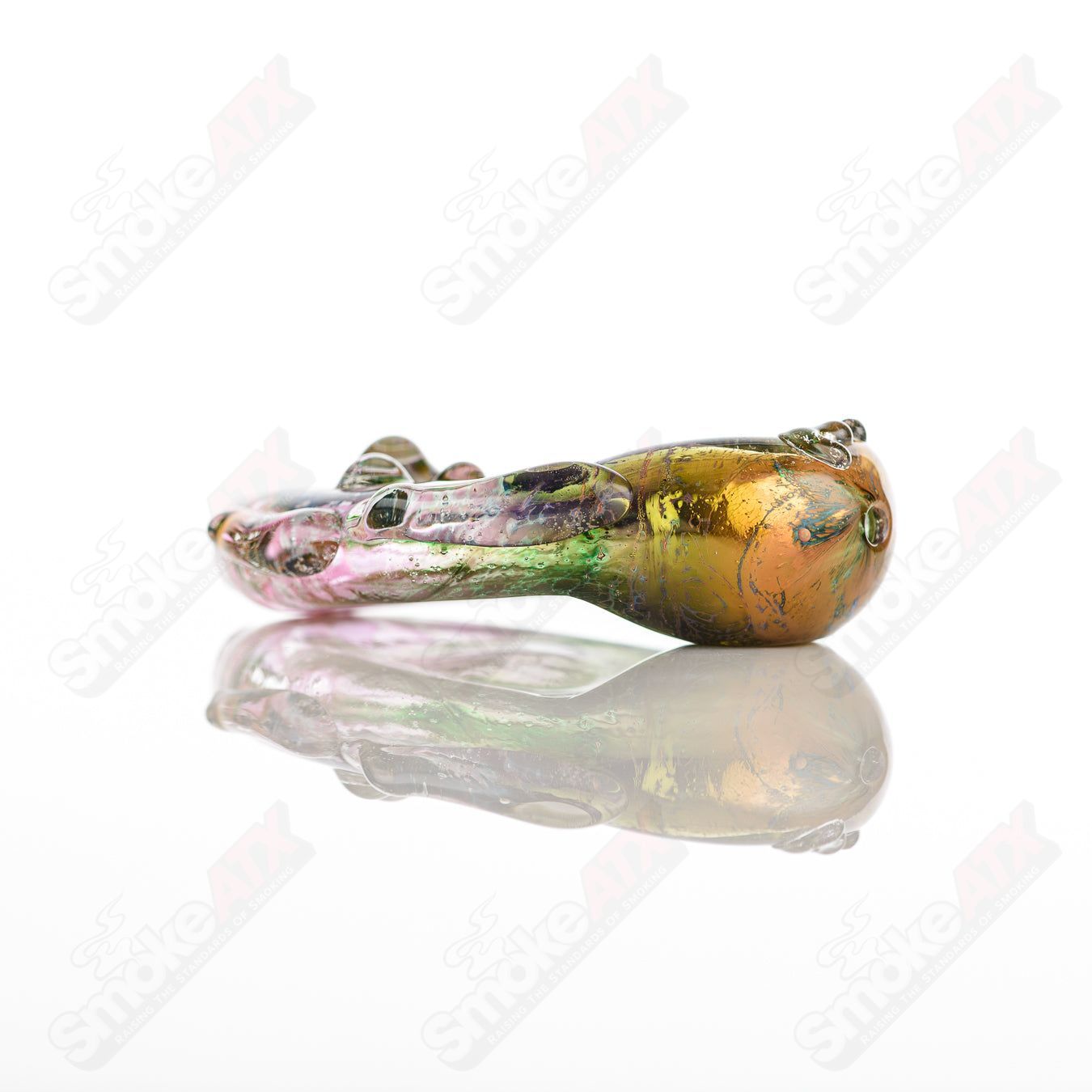 Glass pipe featuring a 20 Goddess design by Nobody, made of clear glass with intricate detailing and a smooth bowl.