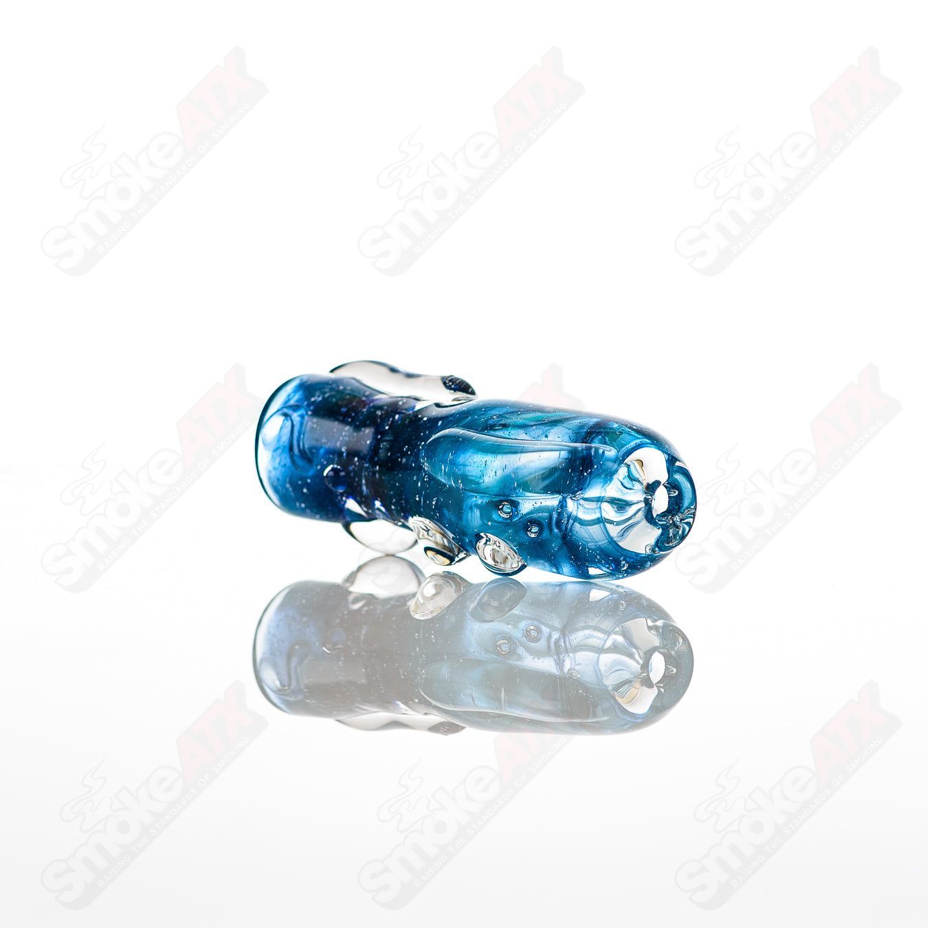 Large glass chillum by Nobody, showcasing clear, cylindrical design with a smooth mouthpiece and detailed glasswork.