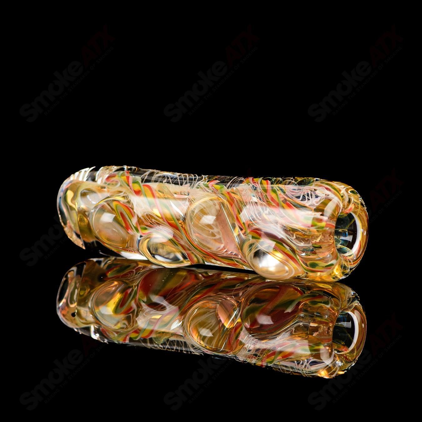 Clear Texas Hot Glass Taster Chillum with a compact, cylindrical design for easy use and smooth smoking experience.