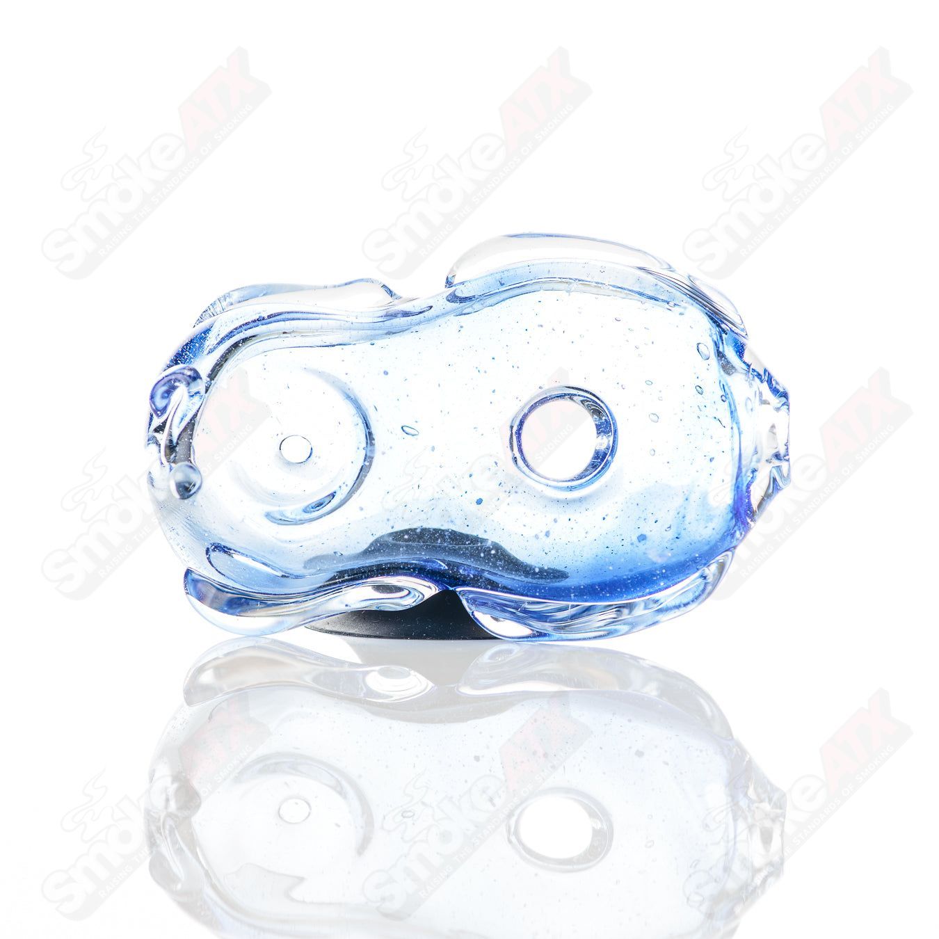 Glass pipe by Nobody featuring a colorful donut design, perfect for smoking, with a clear glass body and intricate detailing.