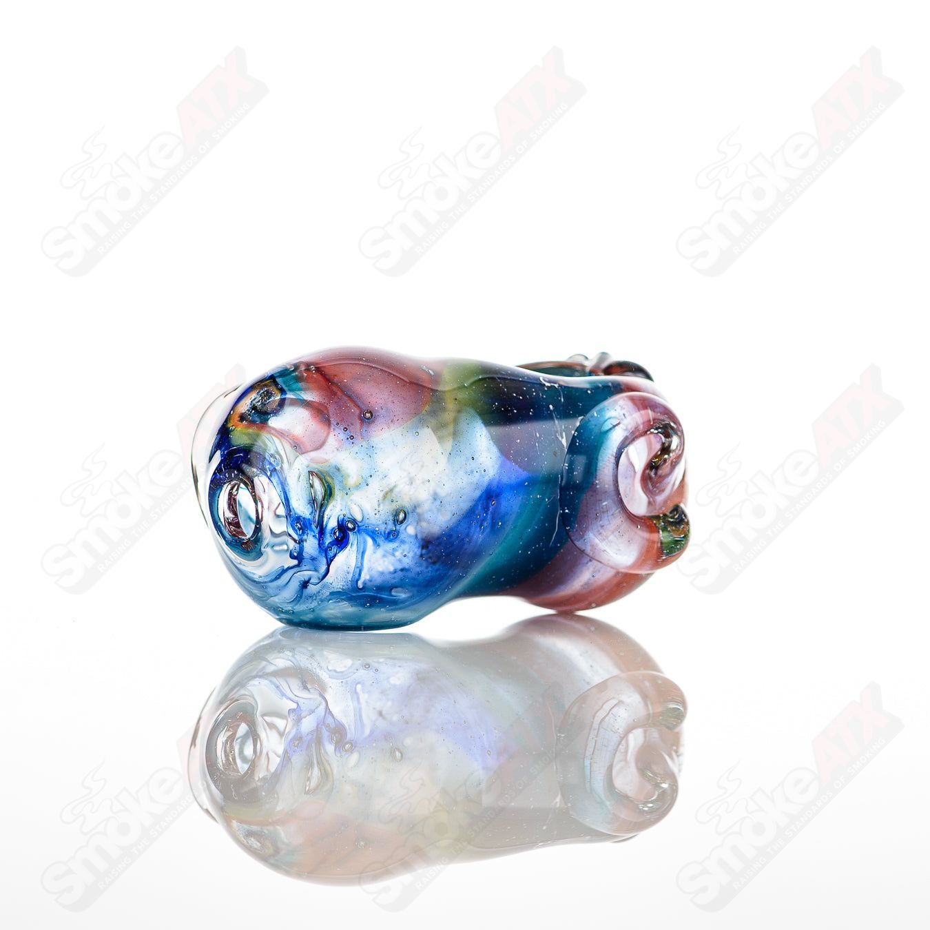 Glass pipe called the Bean Spoon by Nobody, featuring a clear glass design with a bean-shaped bowl for smoking.