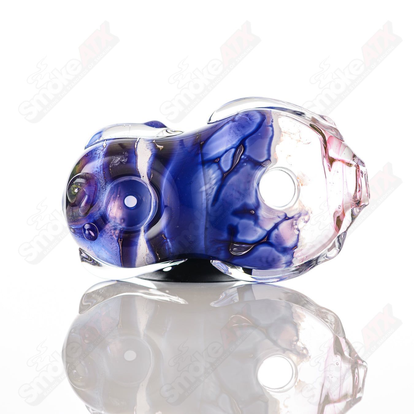 Glass by Nobody Donut Chillum glass pipe featuring a colorful goddess design and smooth, rounded shape for easy handling.