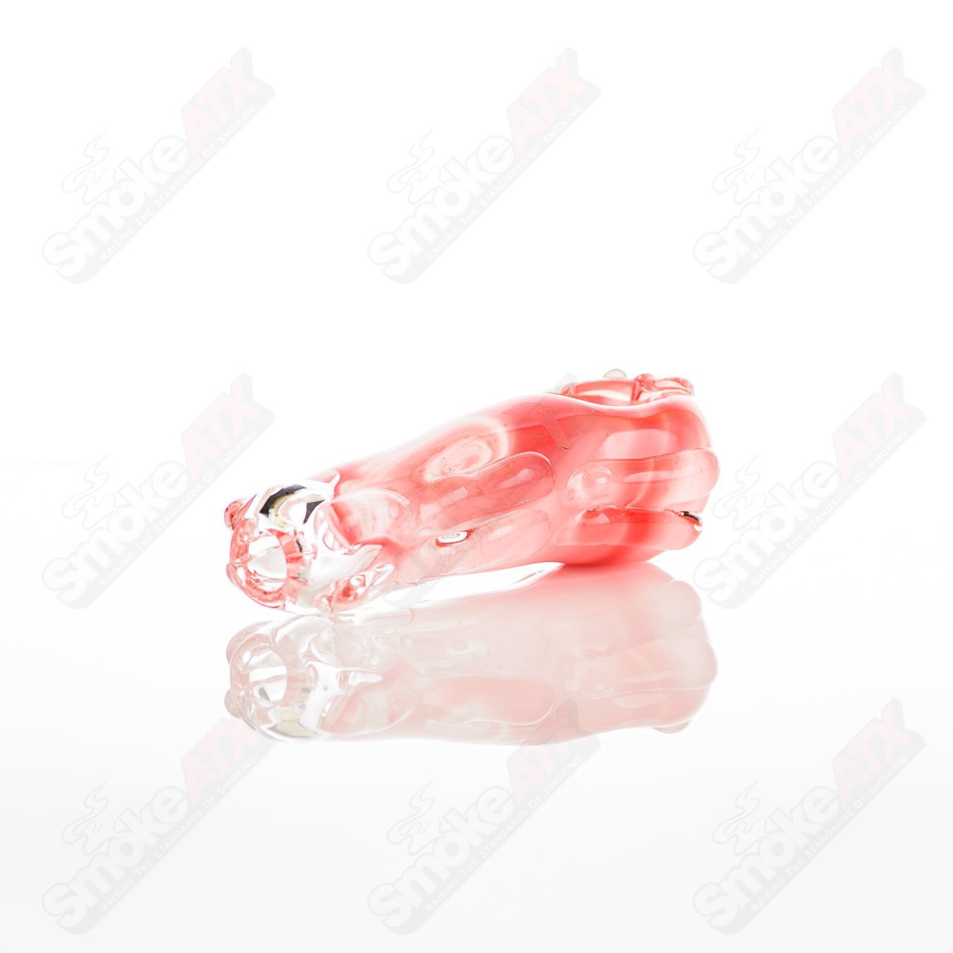 Glass pipe called #22 Spoon Glass by Nobody, featuring a clear glass bowl with a smooth, rounded shape and intricate design details.