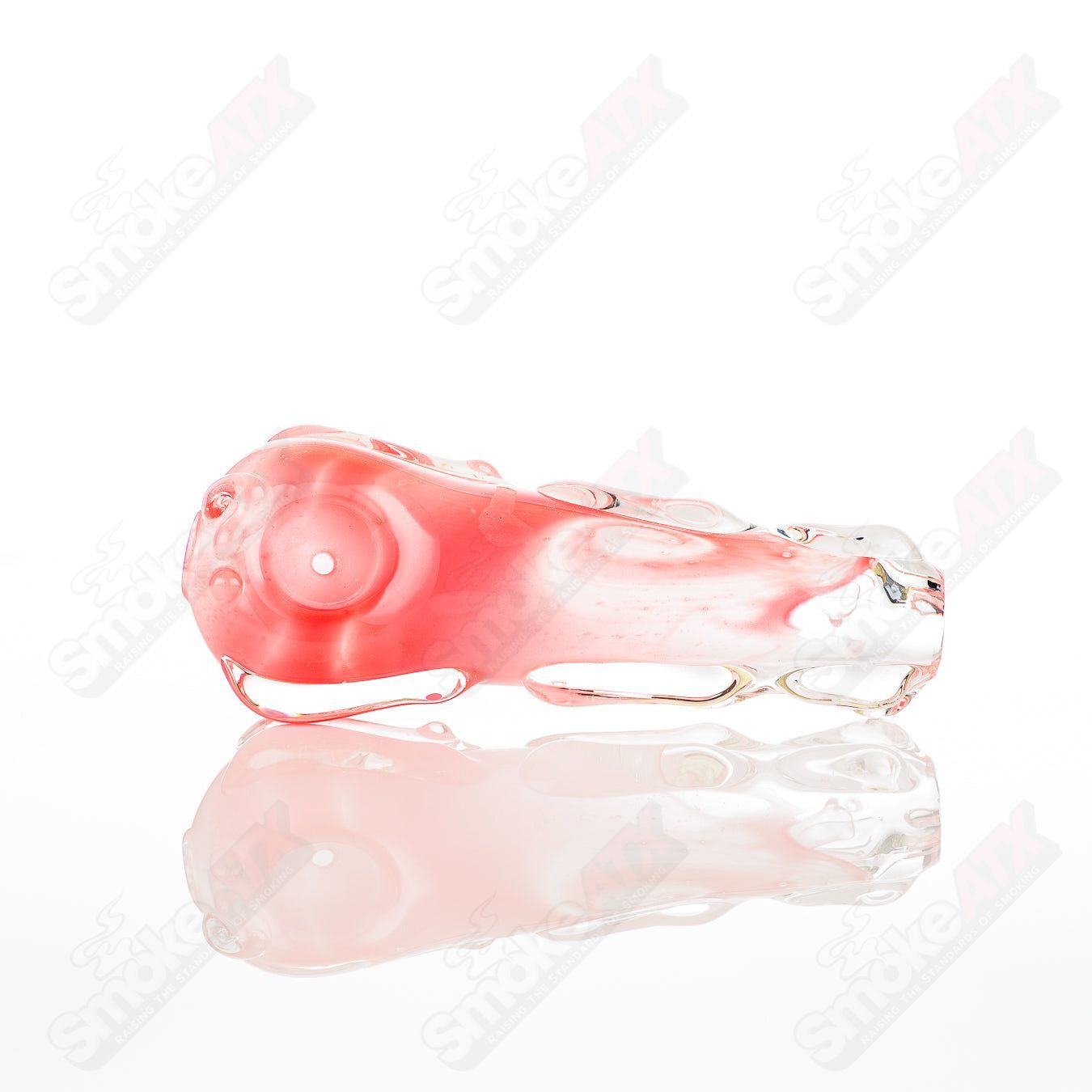 Glass pipe called the #22 Spoon Glass by Nobody, clear glass with a rounded spoon shape and smooth finish.