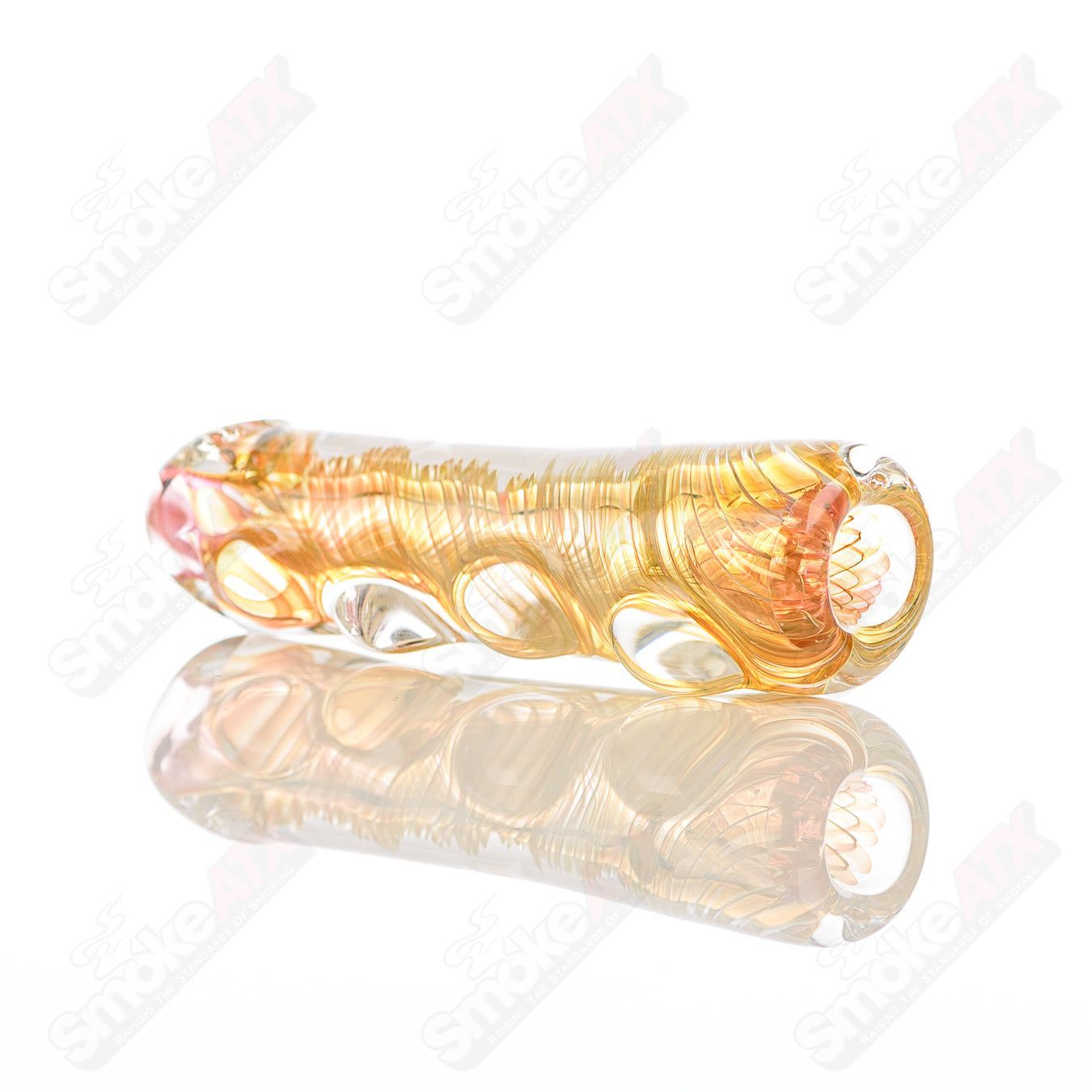 Texas Hot Glass Taster #22 Chillum glass pipe with clear glass and intricate design, ideal for discreet smoking sessions.