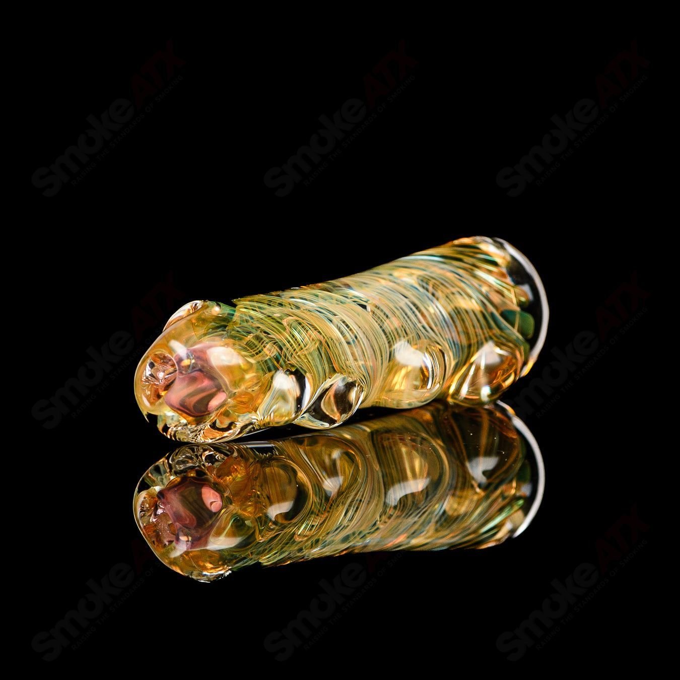 Texas Hot Glass 22 Taster Texas Hot Chillum glass pipe with clear glass design and compact shape for easy use.