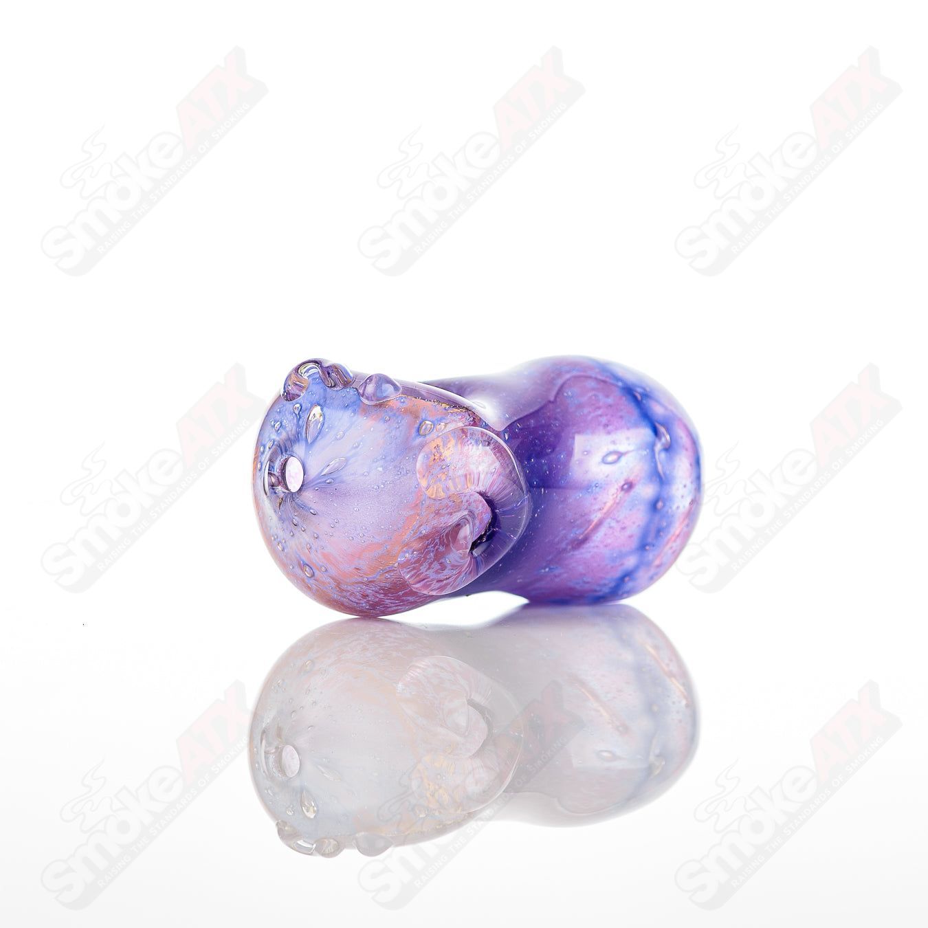 Glass pipe called #23 Bean Spoon by Nobody, featuring a clear glass design with a bean-shaped bowl and smooth mouthpiece.