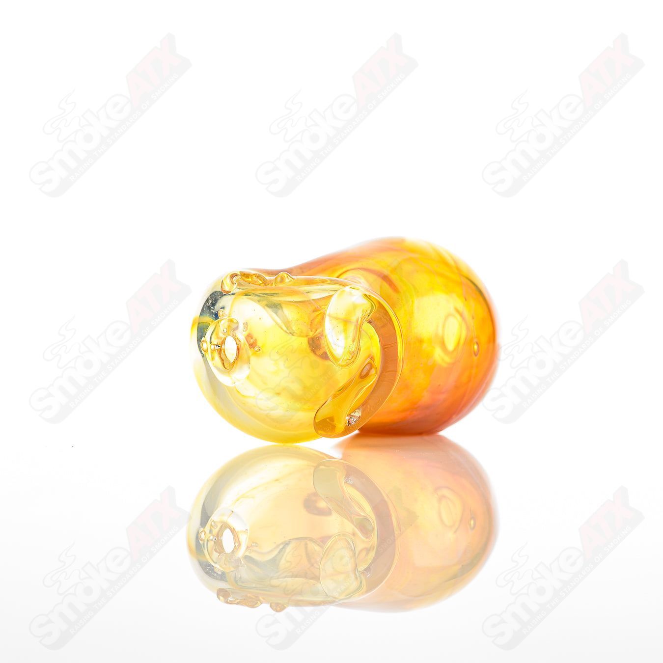 Glass pipe called the #24 Bean Spoon by Nobody, featuring a clear glass design with a rounded bowl and smooth stem.