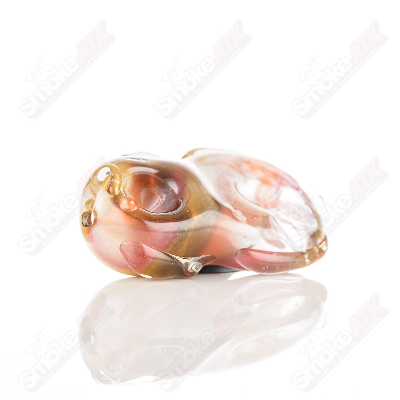 Glass pipe by Nobody featuring a colorful donut design, made from clear glass with a smooth bowl and mouthpiece.