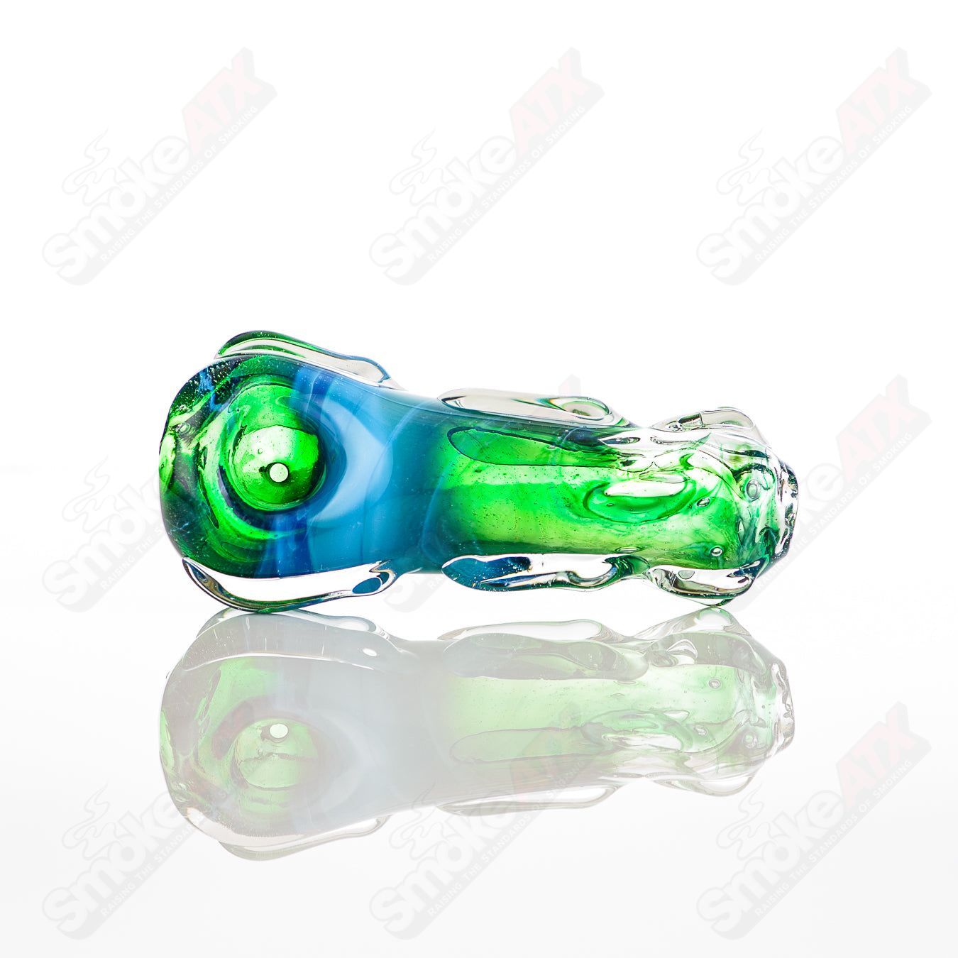 Clear glass spoon pipe by Nobody featuring a smooth, rounded bowl and a long, slender neck for handheld use.