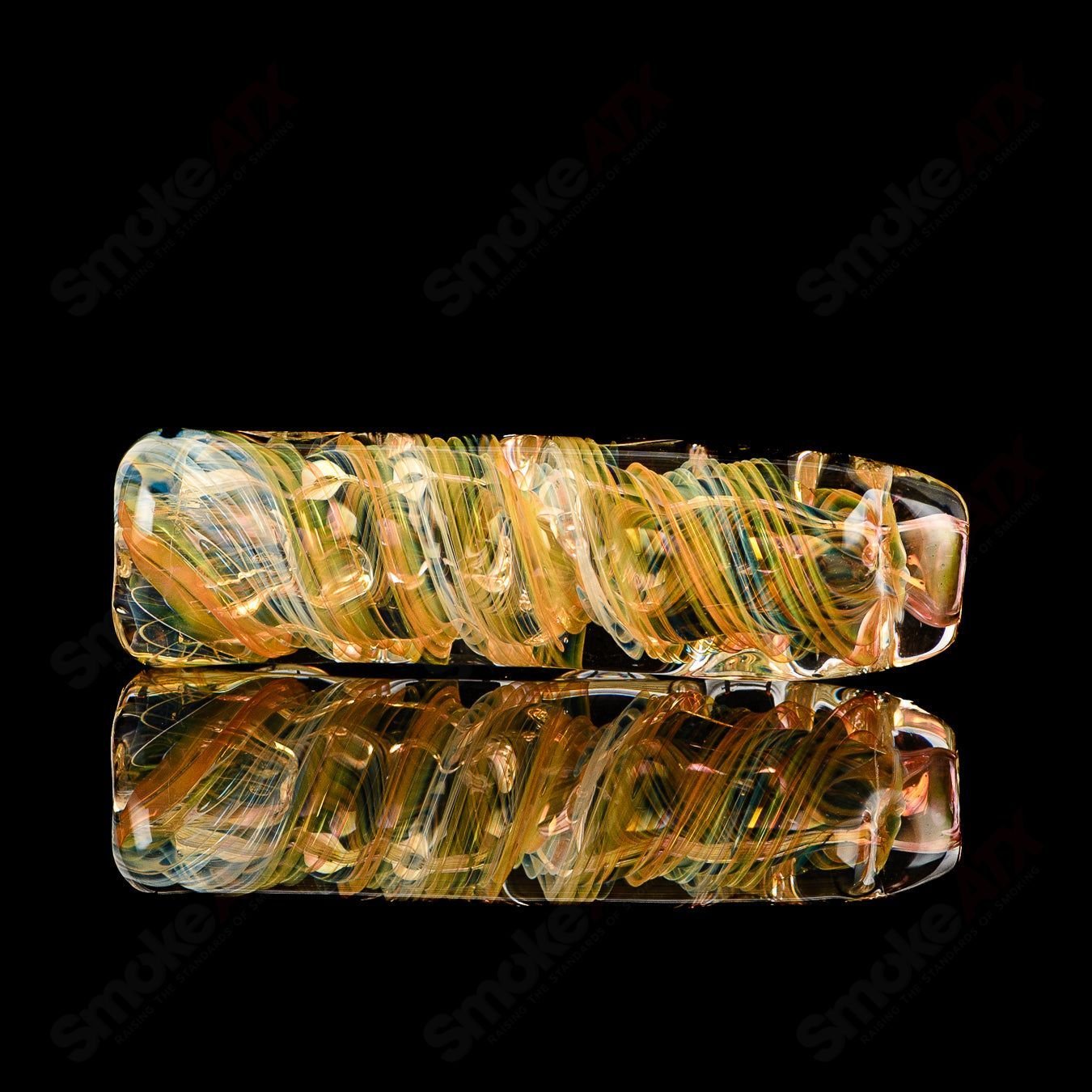 Texas Hot Glass 24 Taster Texas Hot Chillum glass pipe with a clear design and compact shape for easy handling.