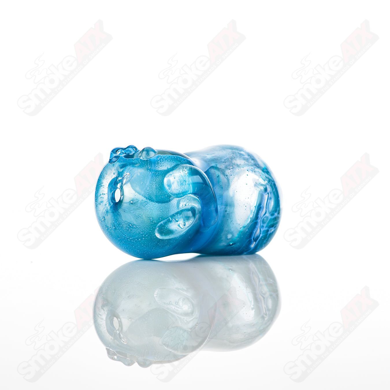 Glass pipe called #25 Bean Spoon by Nobody, featuring a clear glass design with bean-shaped details, used for smoking.