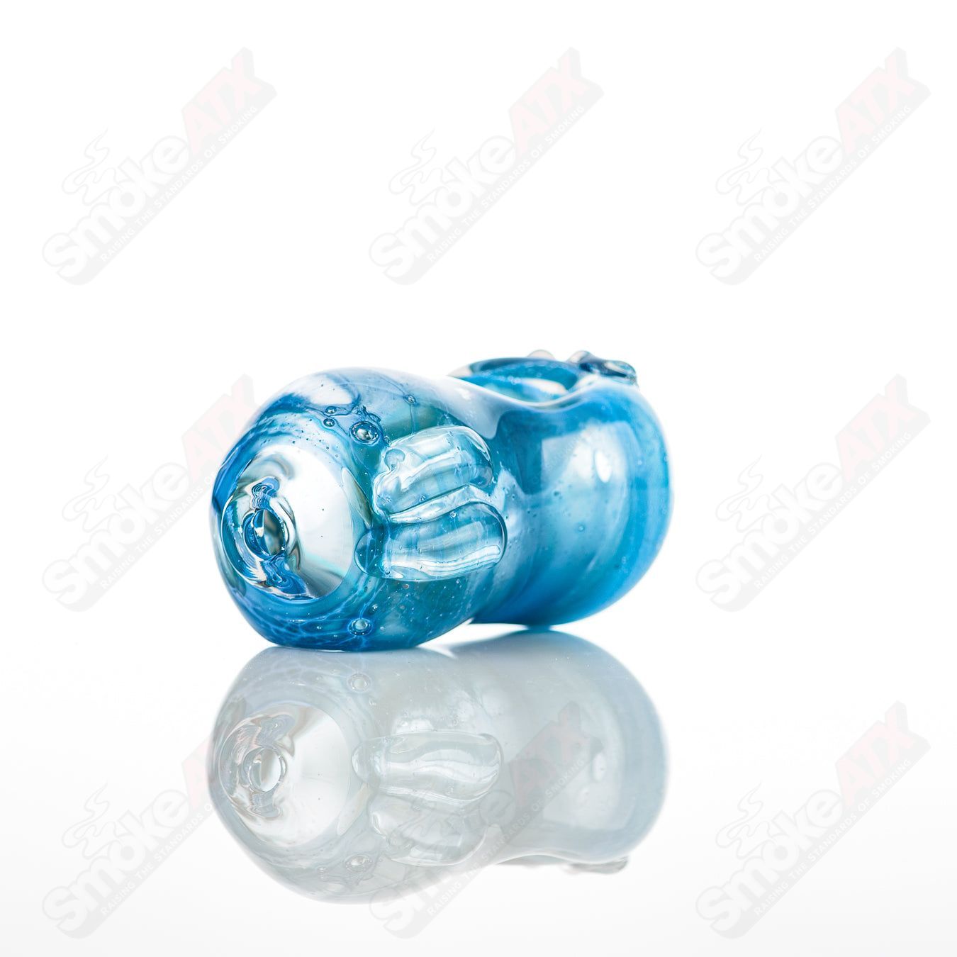 Glass pipe called the #25 Bean Spoon by Nobody, featuring a clear glass design with a bean-shaped bowl and smooth mouthpiece.