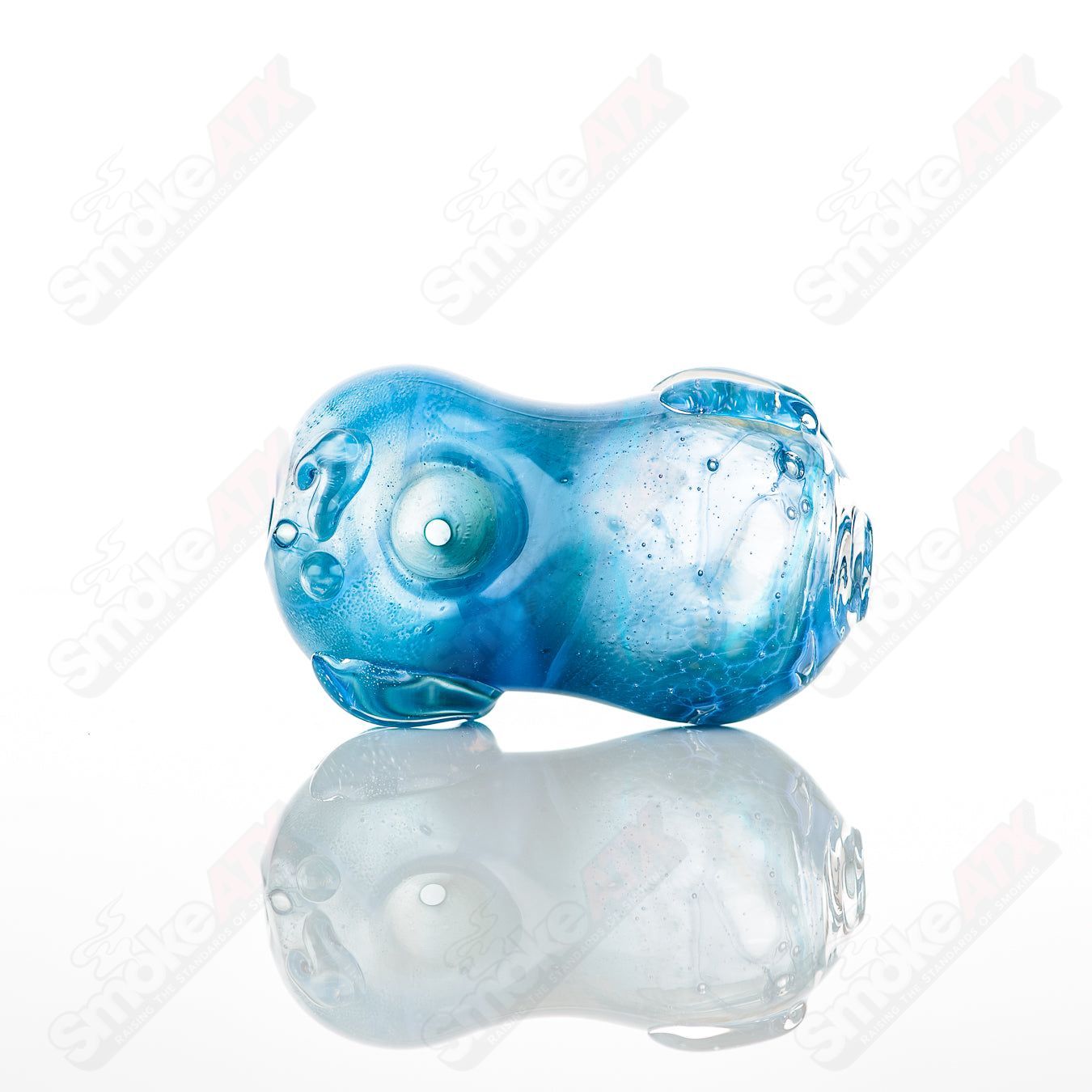 Glass pipe called the #25 Bean Spoon by Nobody, featuring a clear glass design with a bean-shaped bowl for smoking.