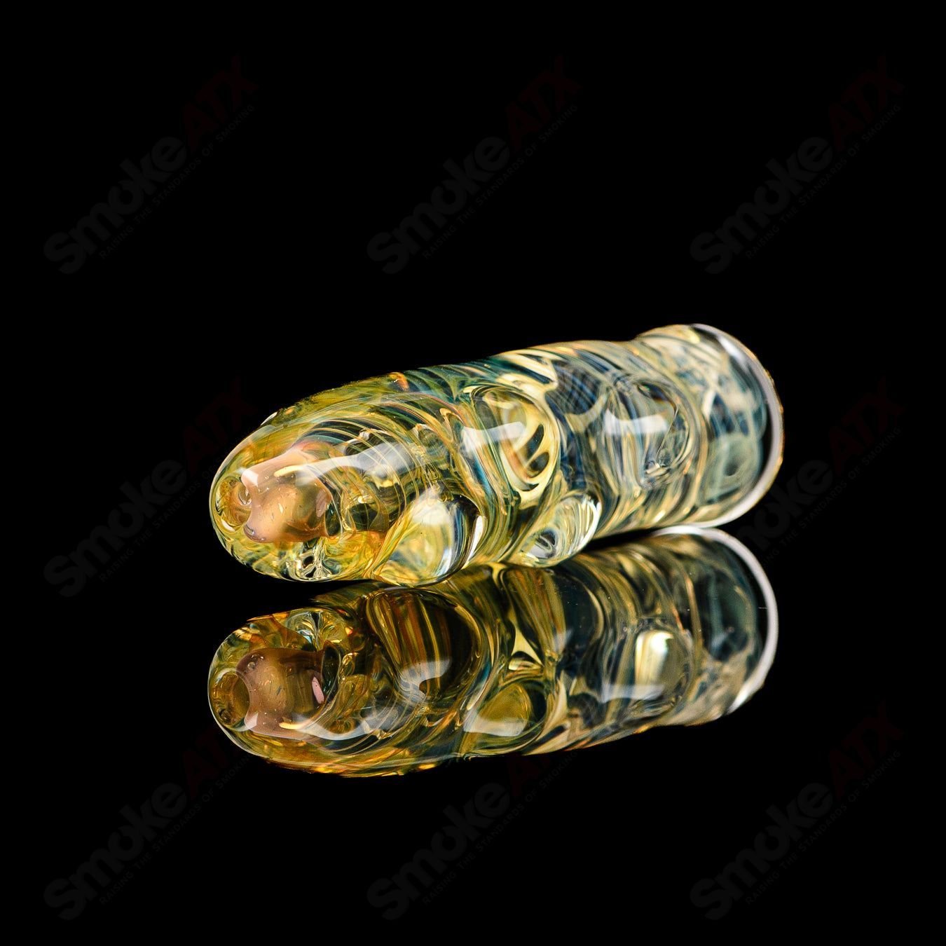 Texas Hot Glass #25 Taster Chillum glass pipe, compact and clear with a smooth mouthpiece and detailed bowl design.