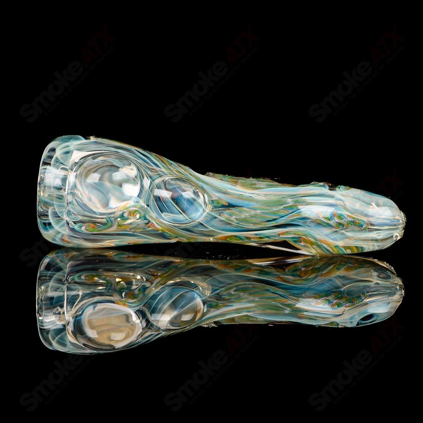 Texas Hot Glass Taster #26 Texas Hot Chillum glass pipe with a clear, smooth design and compact shape for easy handling.