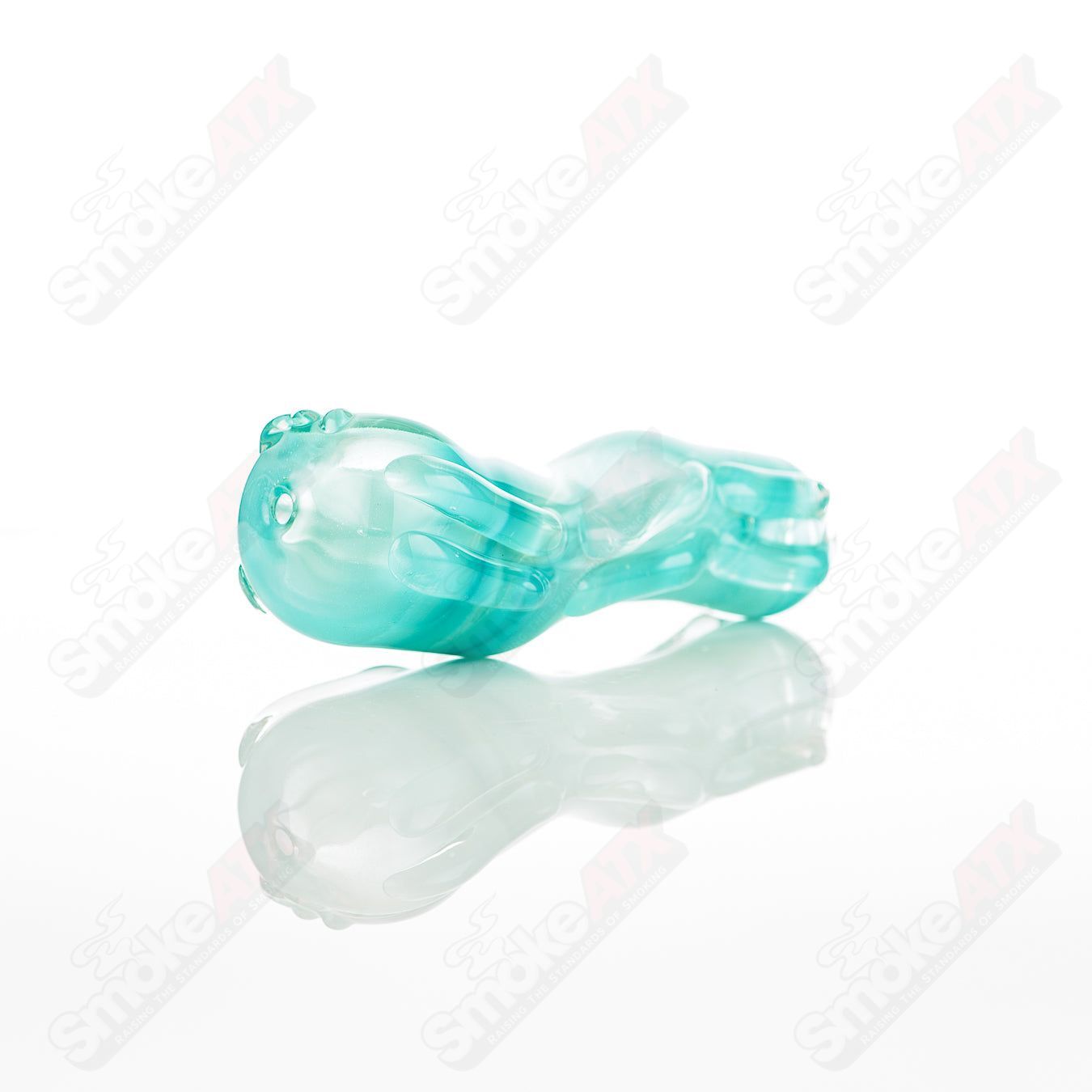 Glass pipe called #27 Spoon by Nobody, featuring a clear glass design with a rounded bowl and a long stem for easy handling.