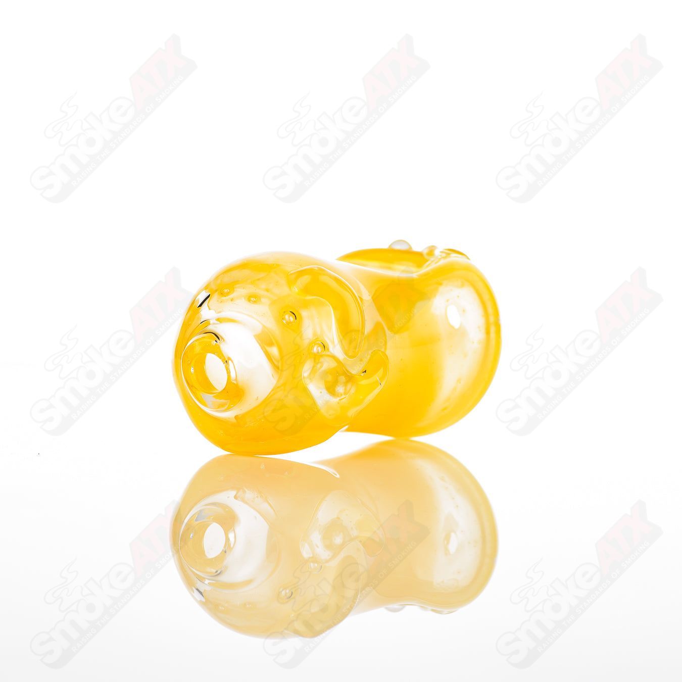 Glass pipe called #28 Bean Spoon by Nobody, featuring a clear glass design with a bean-shaped bowl and smooth finish.