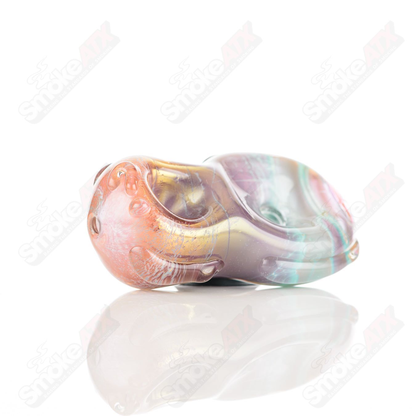 Glass pipe featuring a colorful donut chillum design by Nobody, made of clear glass with detailed decorative elements.