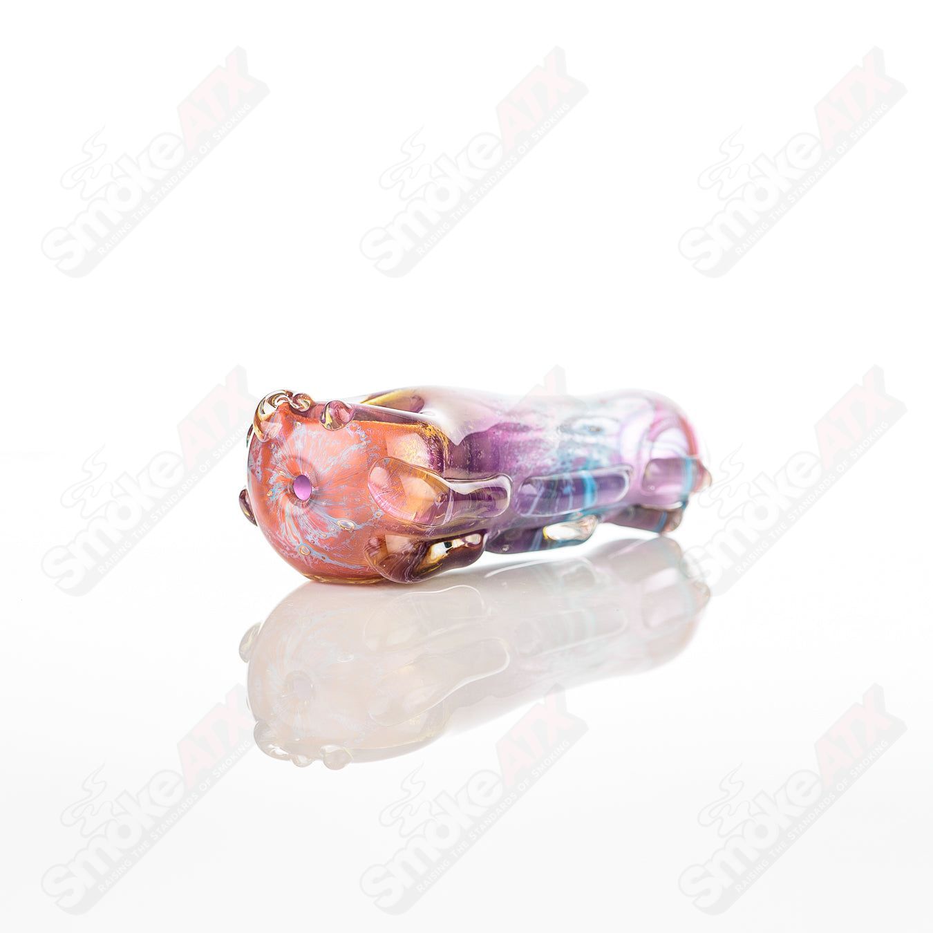 Glass pipe called #28 Spoon Glass by Nobody, clear glass with smooth rounded bowl and slender stem, designed for smoking.