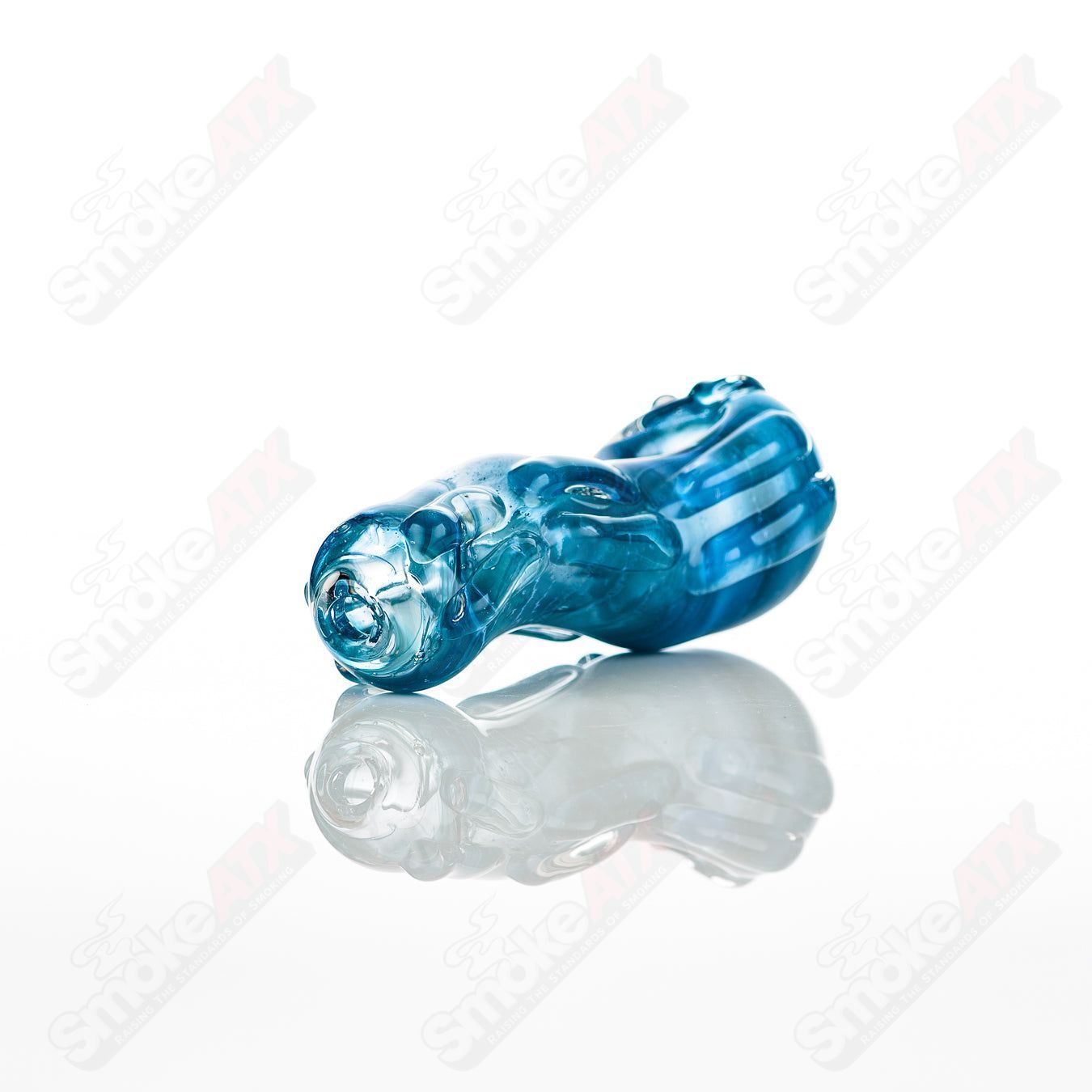 Glass pipe called Spoon Glass by Nobody, featuring a clear glass design with a rounded bowl and smooth mouthpiece.