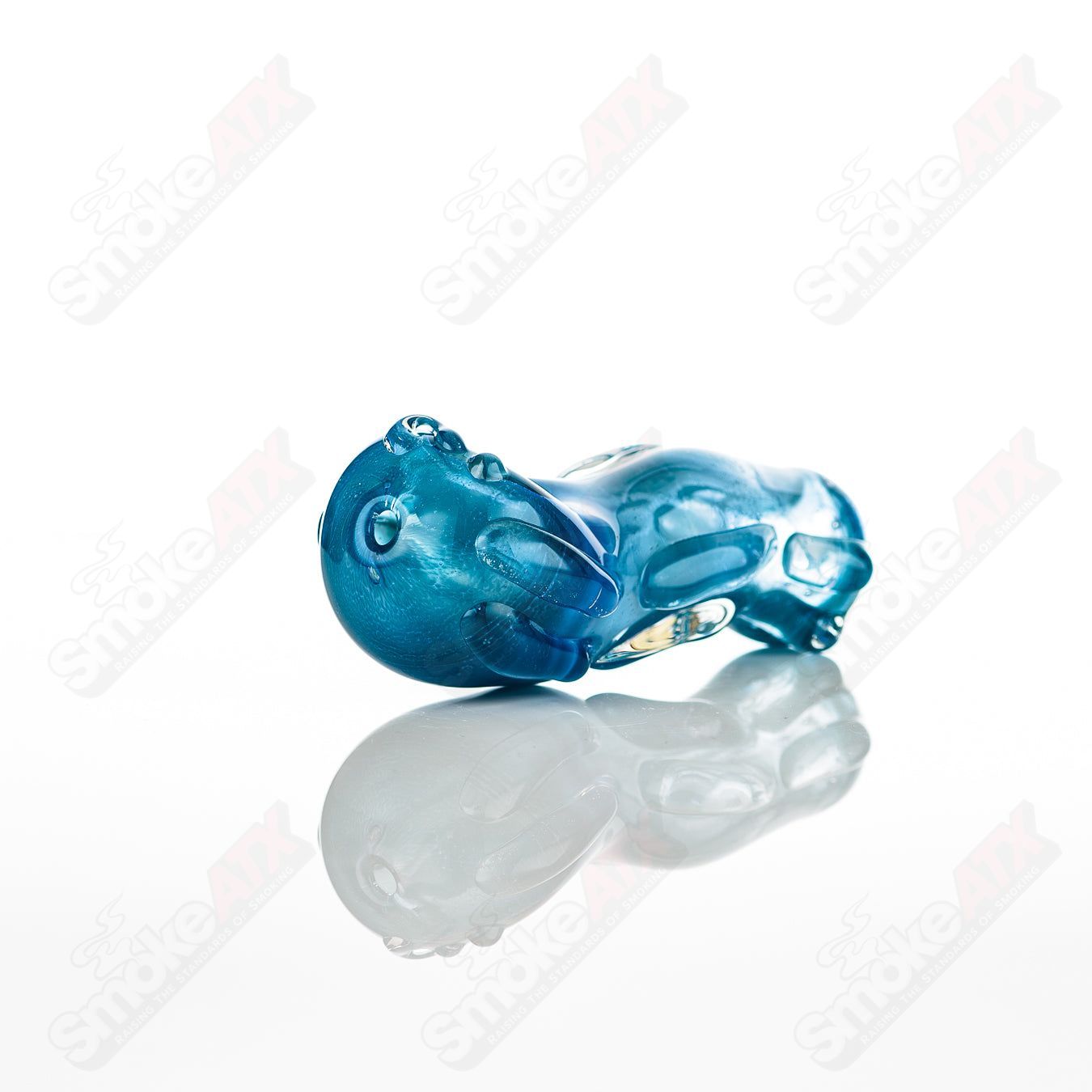 Spoon glass pipe by Nobody featuring a clear glass design with a rounded bowl and straight stem for smoking.