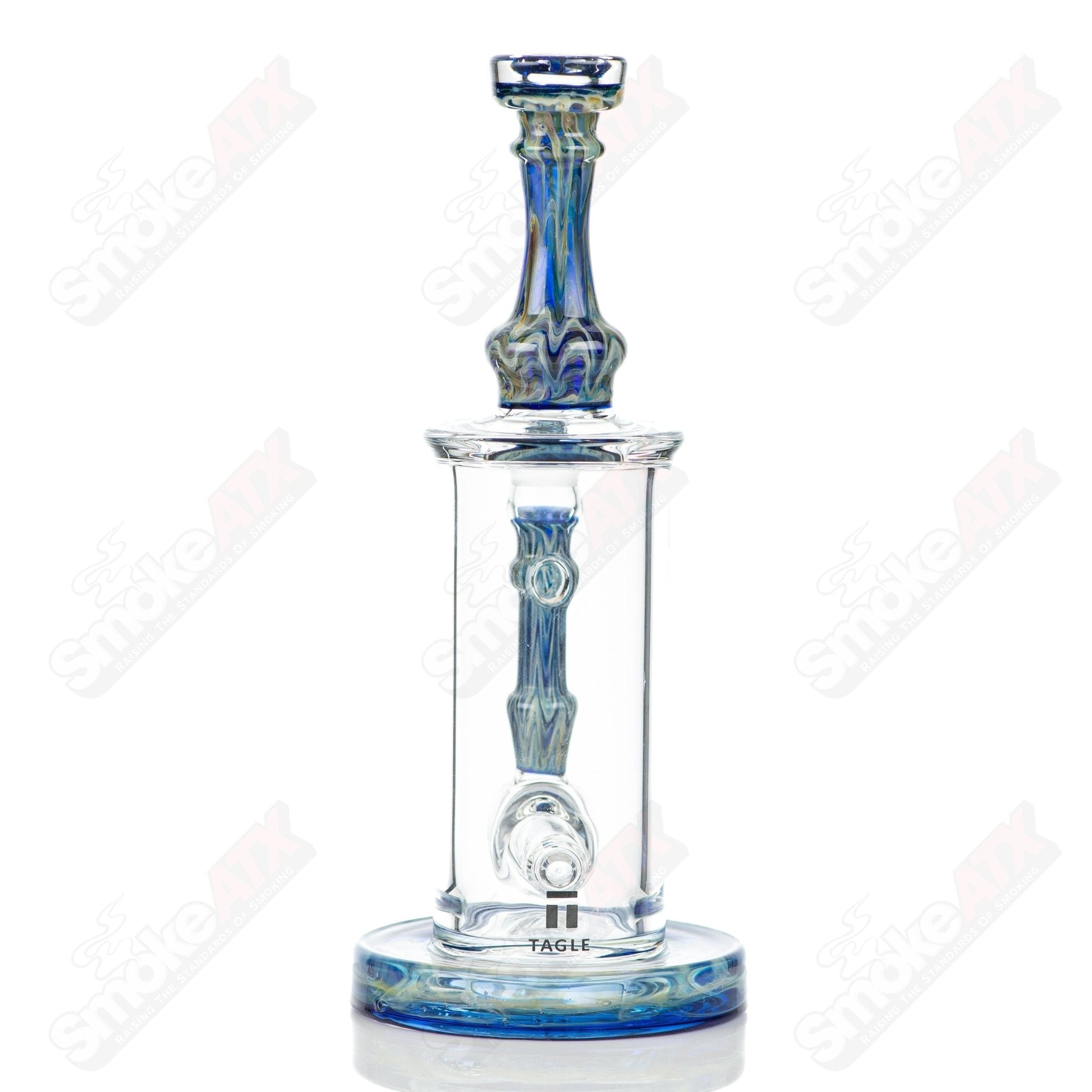 Tagle Glass inline tube bubbler with 18mm and 50mm wrap and rake design, made of clear glass with detailed craftsmanship.