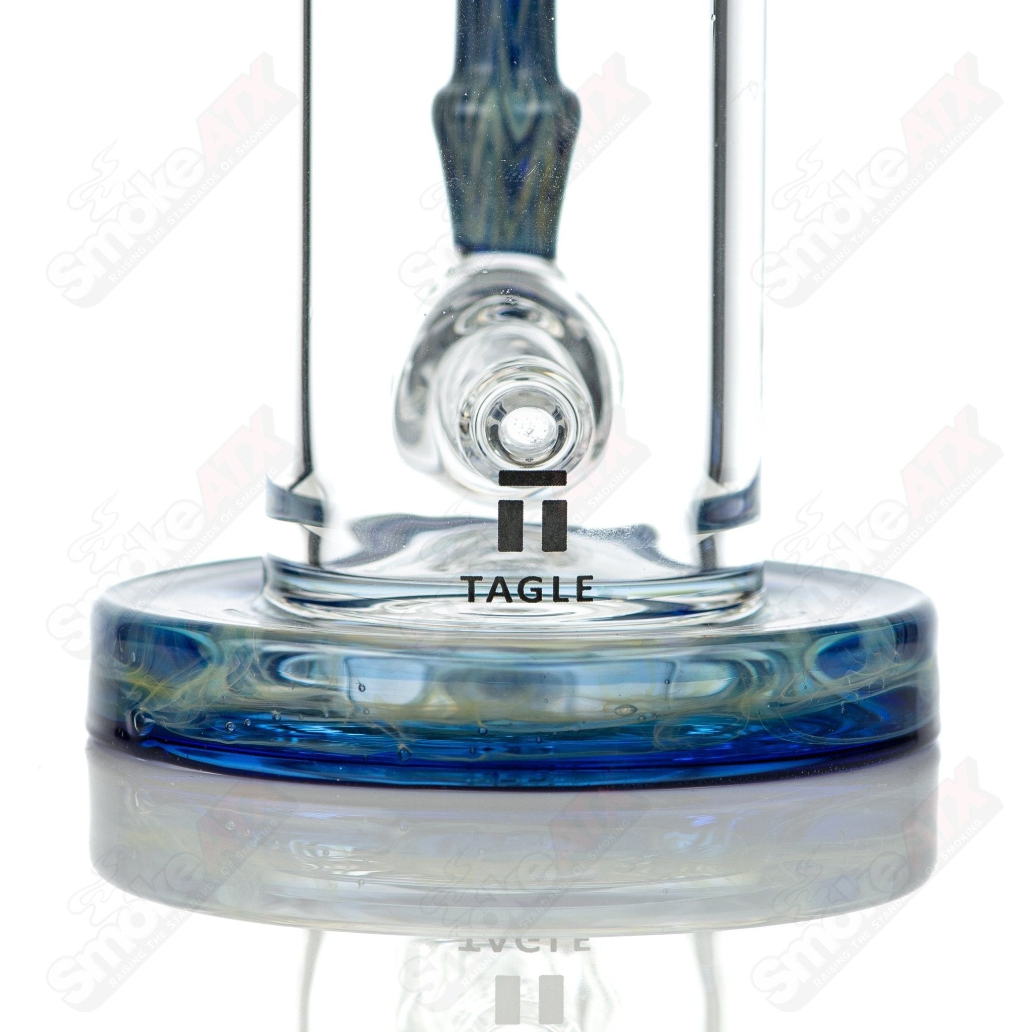 Tagle Glass inline tube bubbler with 18mm and 50mm wrap and rake design, featuring clear glass construction.