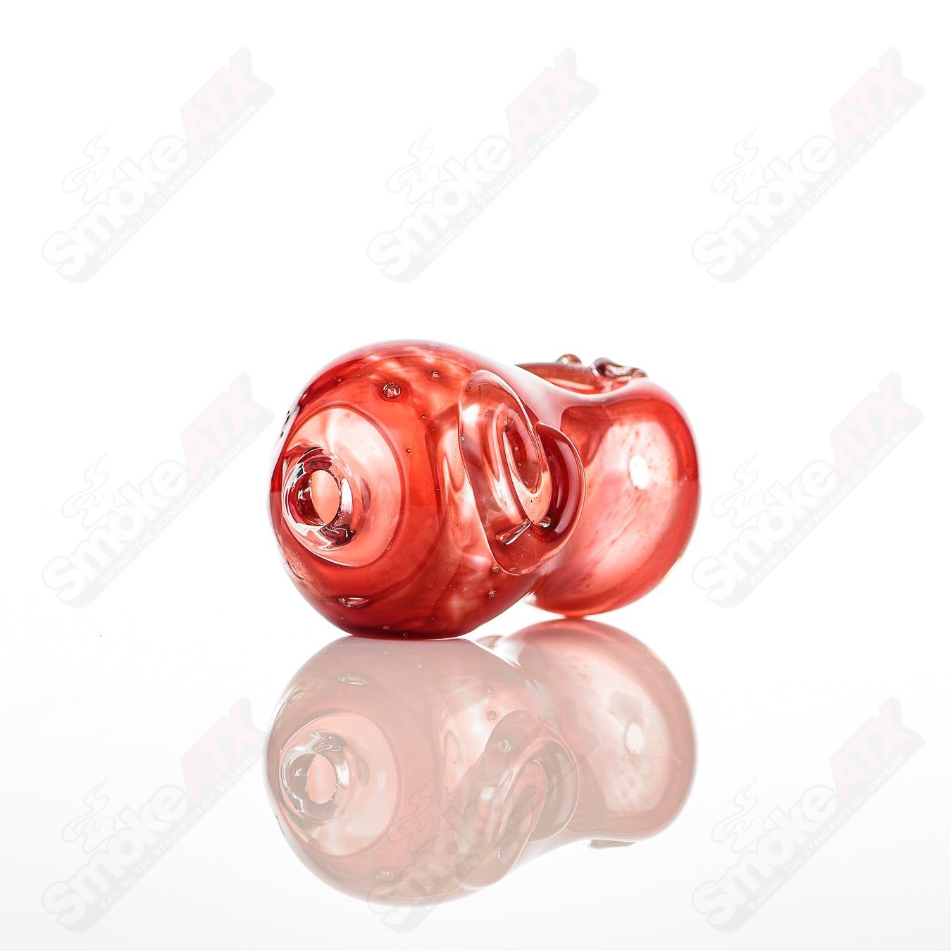 Glass pipe called #3 Bean Spoon by Nobody with a clear glass body and colorful bean-shaped design for smoking enjoyment.
