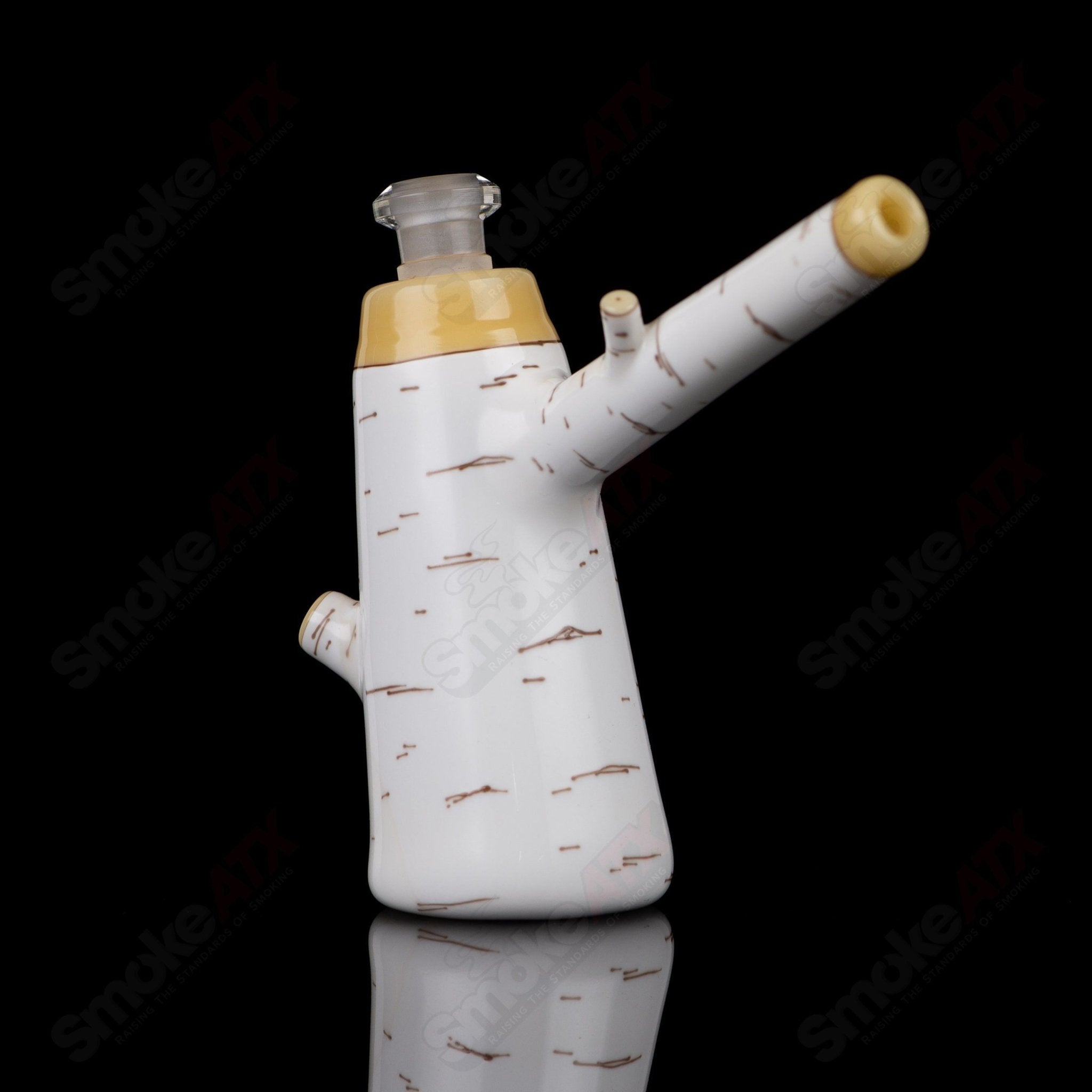 Foster Glass Birch Poker Rig, a clear heady glass concentrate rig with intricate design and thick glass construction.