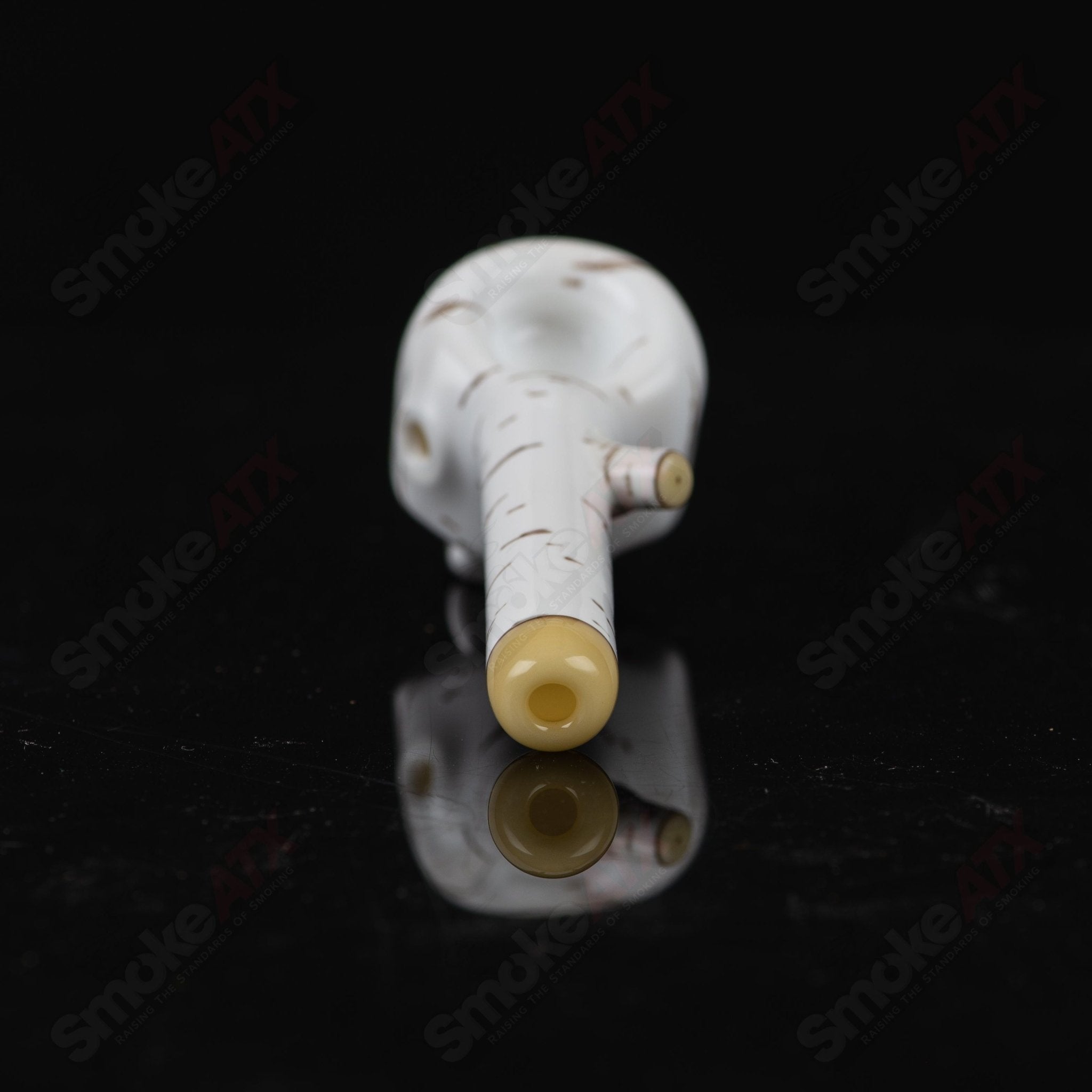 Foster Glass Heady Glass hand pipe featuring a 3-birch skull spoon design, crafted with clear glass and intricate details.