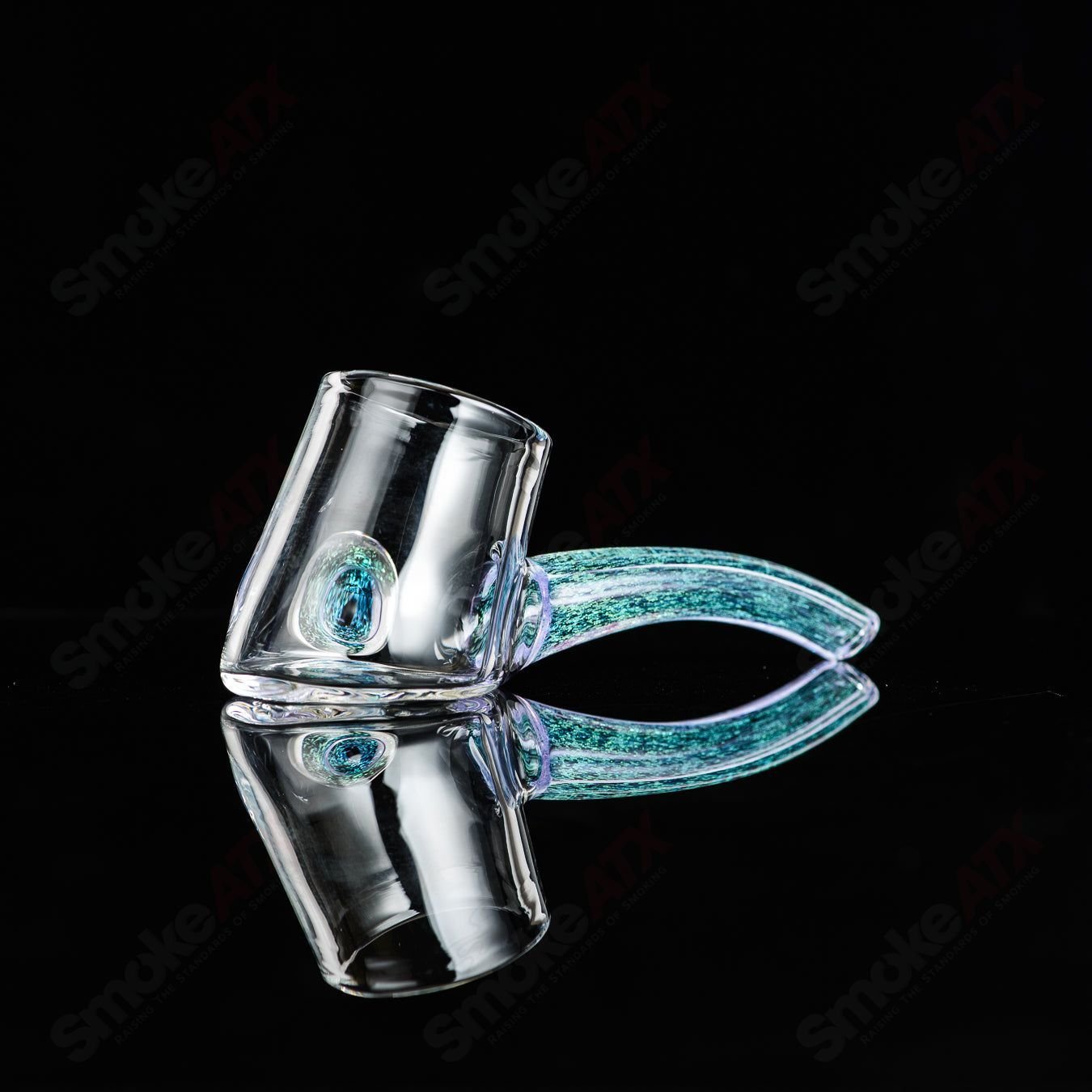 Glass Dichro Proxy Attachment by Justin Freeman, a colorful, reflective glass accessory with intricate design details.