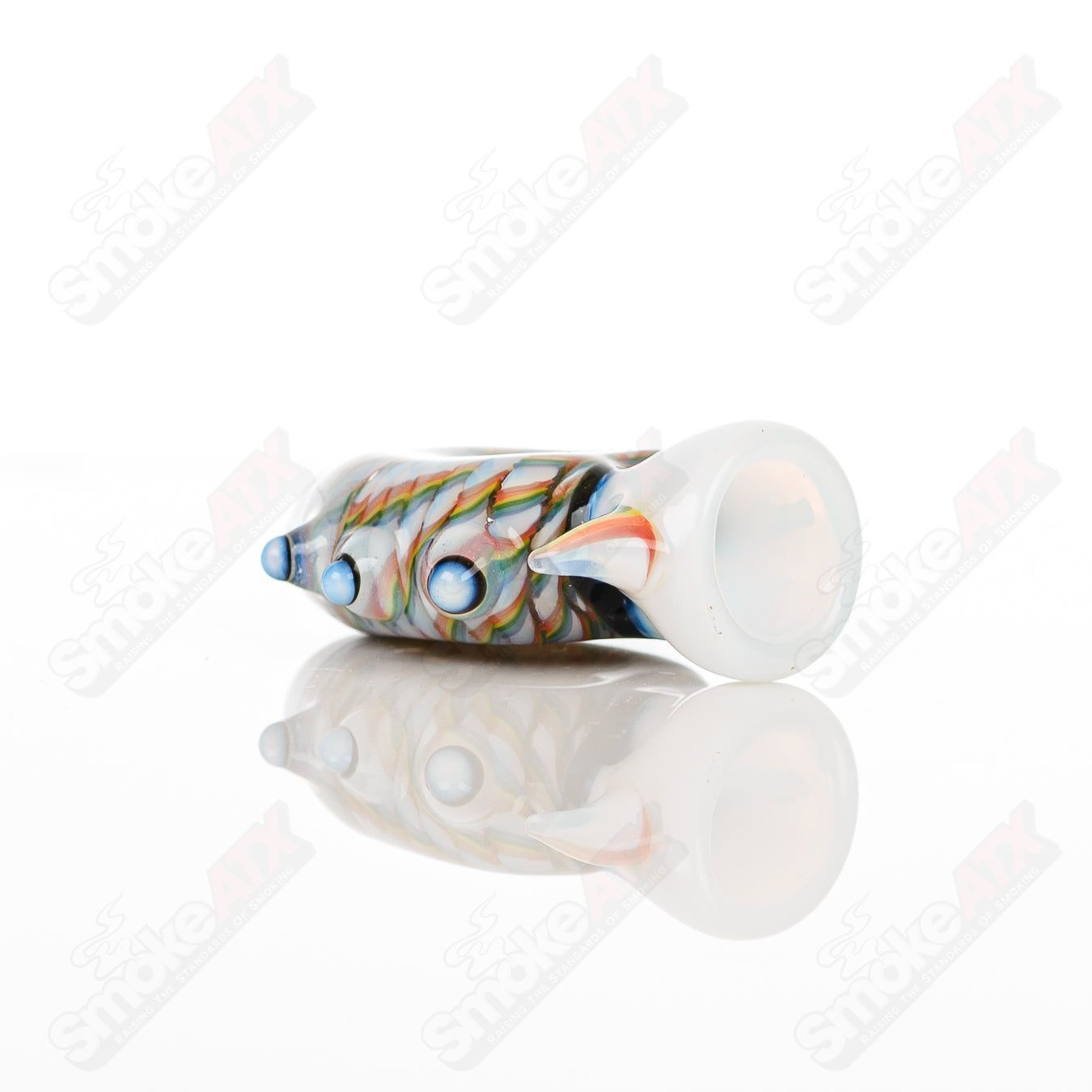 Large glass Donut Chillum by Baby Dabs, designed for baby dabs, featuring a colorful donut-shaped mouthpiece and clear glass body.
