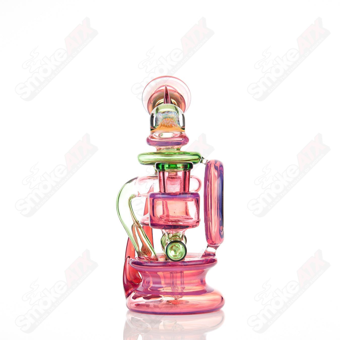 Freeek Glass 3 Terpcycler Rig, a heady recycler glass piece with intricate design and vibrant colors for dabbing and concentrates.