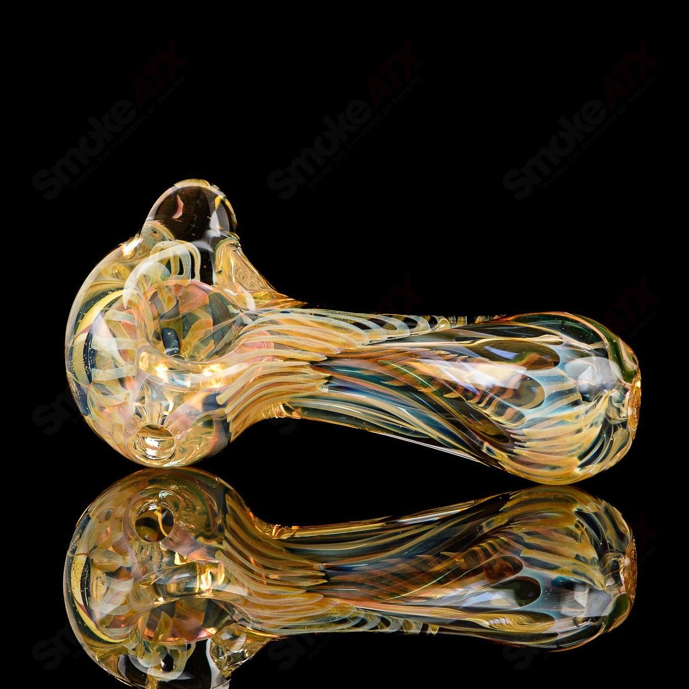 Texas Hot Glass Spoon Chillum, clear glass smoking pipe with a smooth, rounded bowl for discreet use.