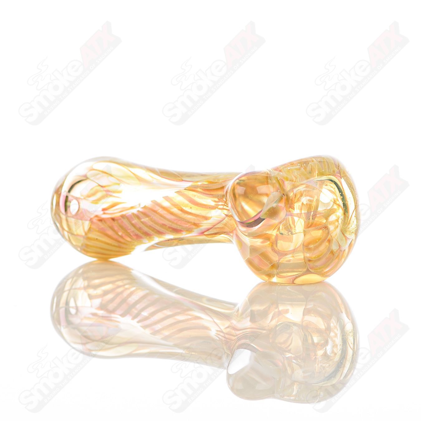 Texas Hot Glass Spoon Chillum, clear glass smoking pipe with a smooth, rounded bowl and sleek design.