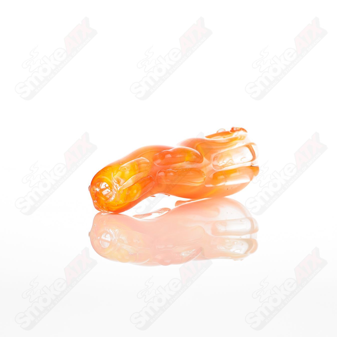 Glass pipe titled #31 Spoon Glass by Nobody, featuring a clear glass design with a rounded bowl and smooth stem for smoking.