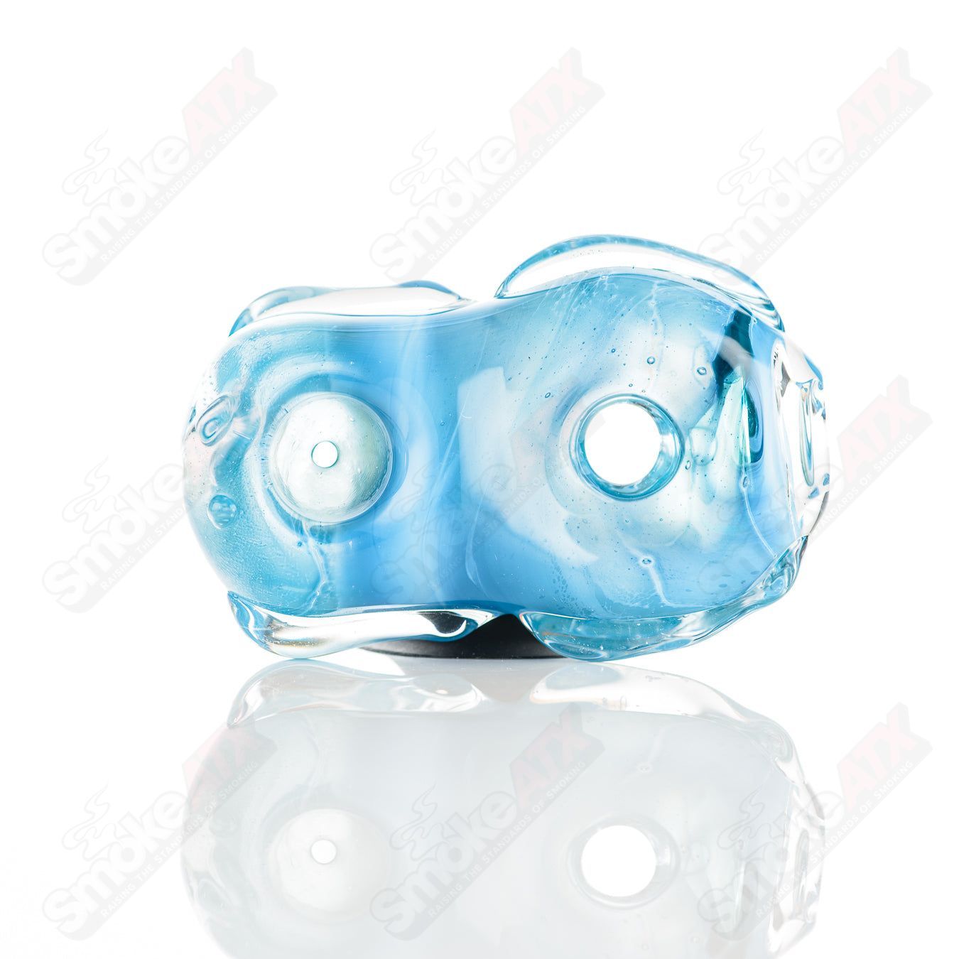 Glass pipe named #6 Donut Chillum by Nobody, featuring a smooth glass design with a donut-shaped bowl and intricate details.