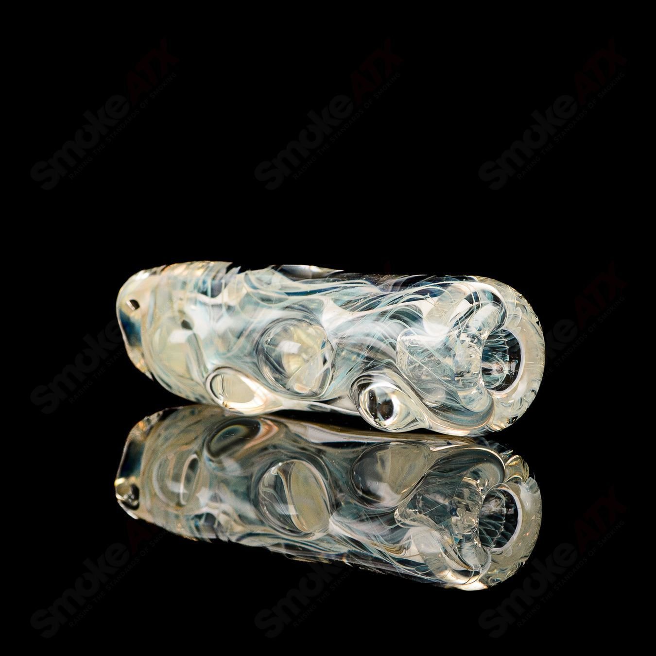 Texas Hot Glass 32 Taster Texas Hot Chillum glass pipe with clear design and compact shape for easy handling.
