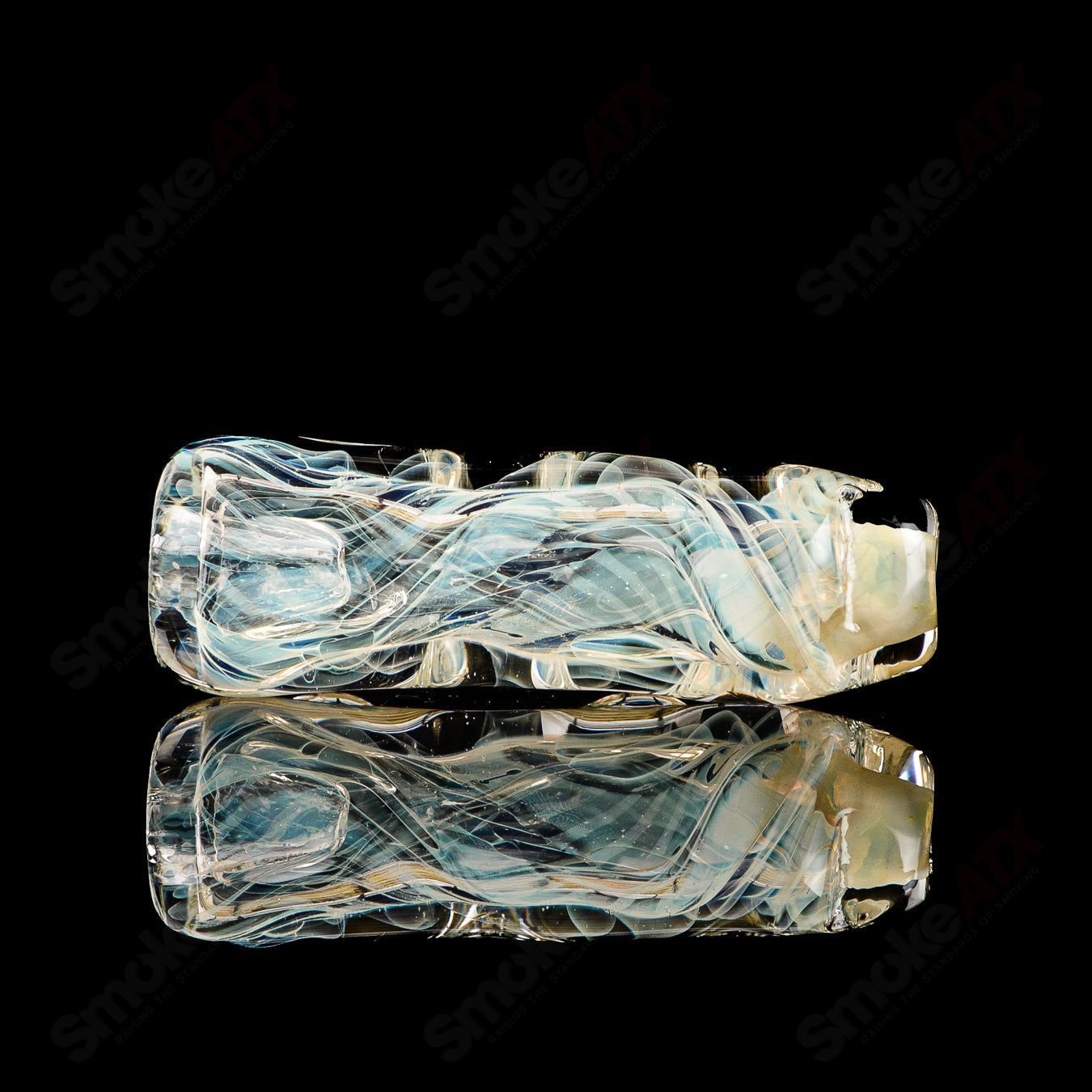 Texas Hot Glass 32 Taster Texas Hot Chillum glass pipe with clear design and compact shape for easy use.