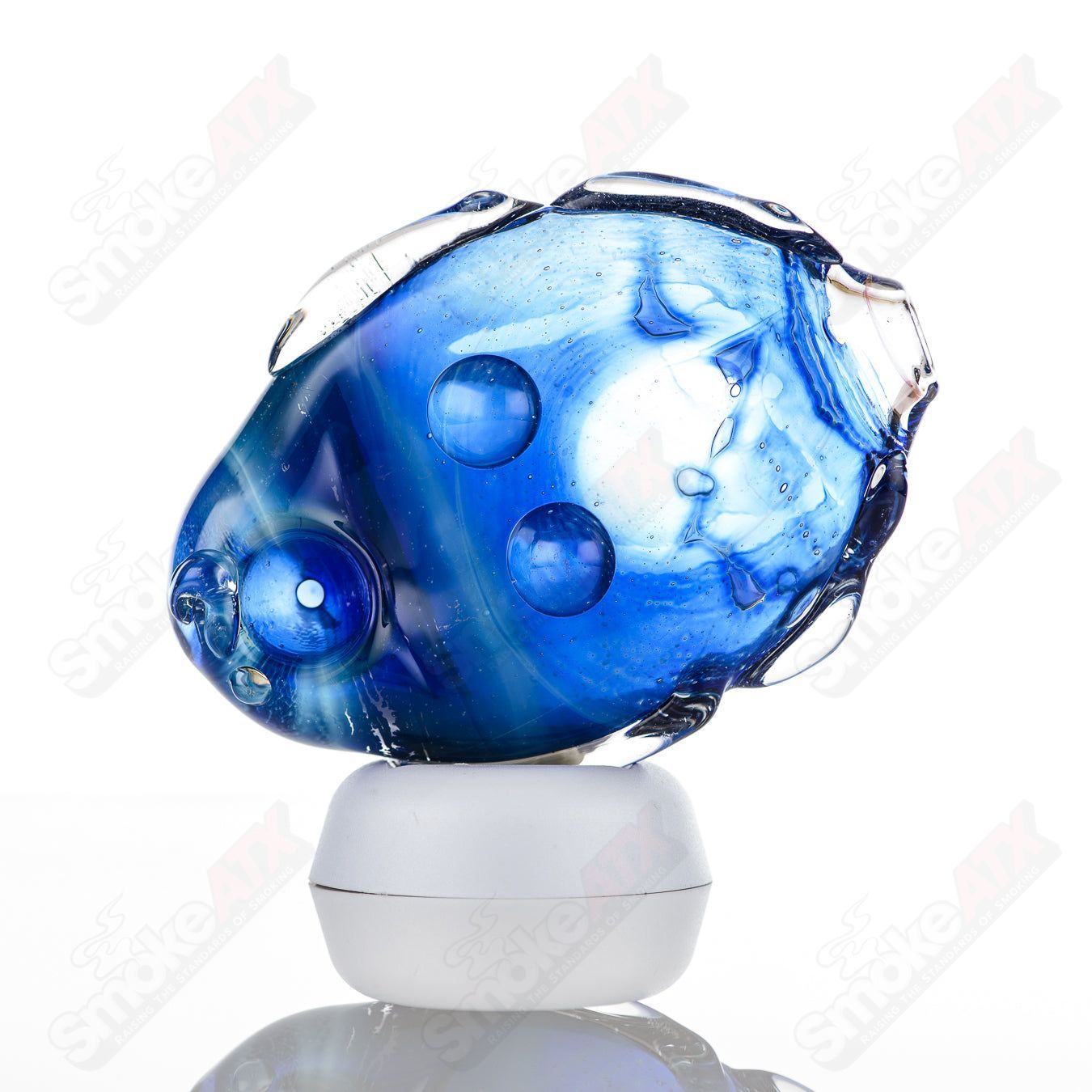 Glass Goddess Pipe by Nobody, clear glass pipe with intricate goddess design, smooth mouthpiece, and detailed craftsmanship.