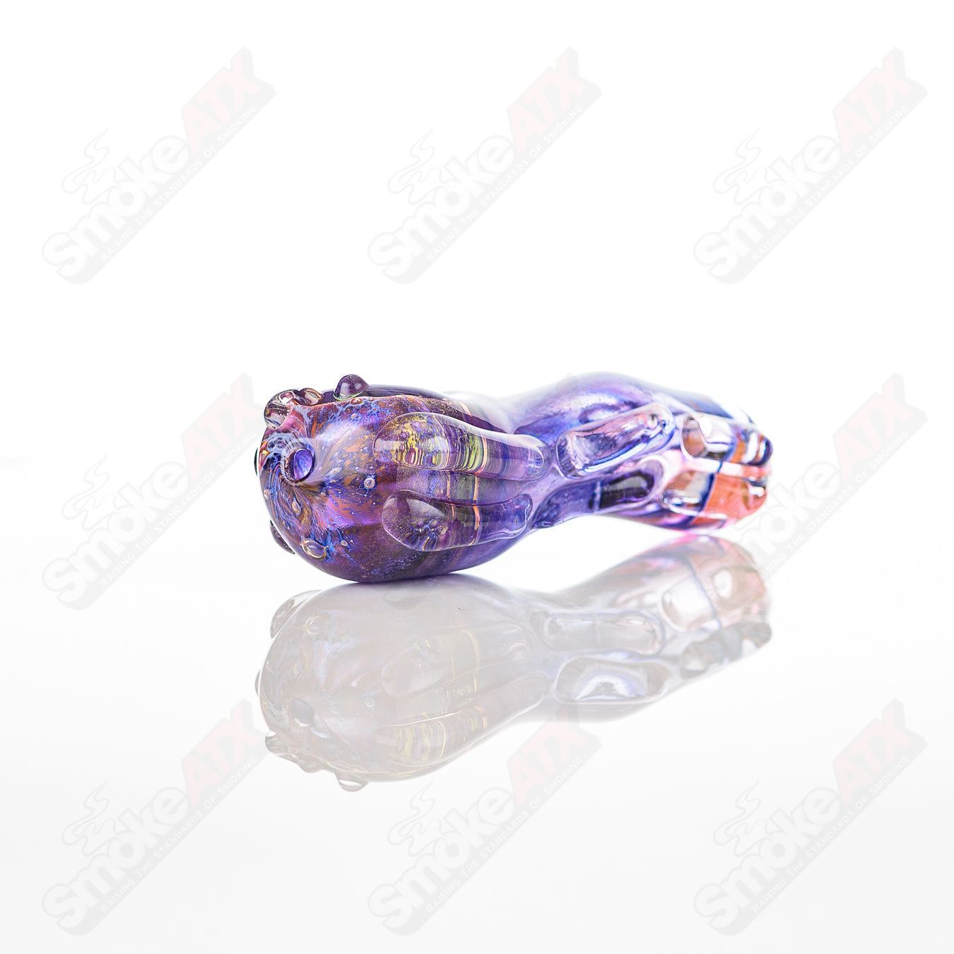Glass pipe called Spoon Glass by Nobody with a clear, smooth glass bowl and stem, designed for smoking purposes.