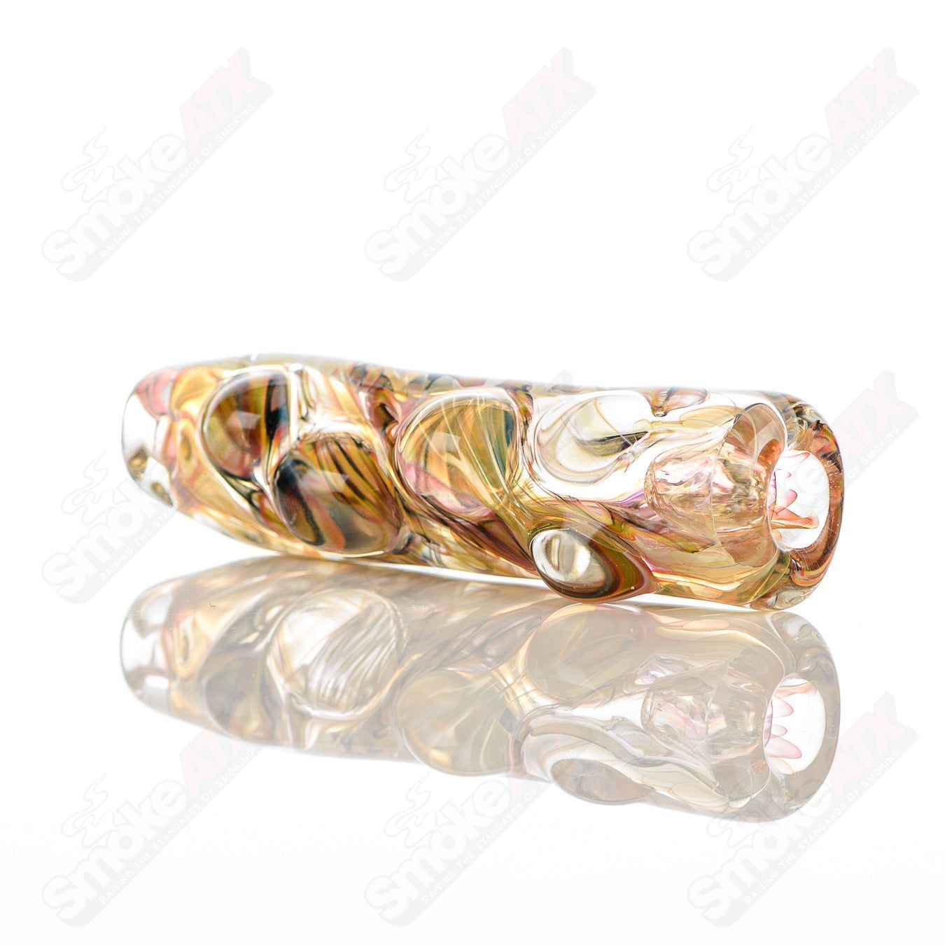 Texas Hot Glass Taster #34 Chillum, clear glass smoking pipe with a compact design, ideal for discreet use.